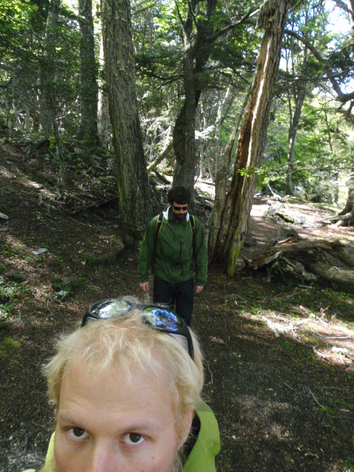 Hiking along the shore in a short wooded section.  The hike was really beautiful and apparently...