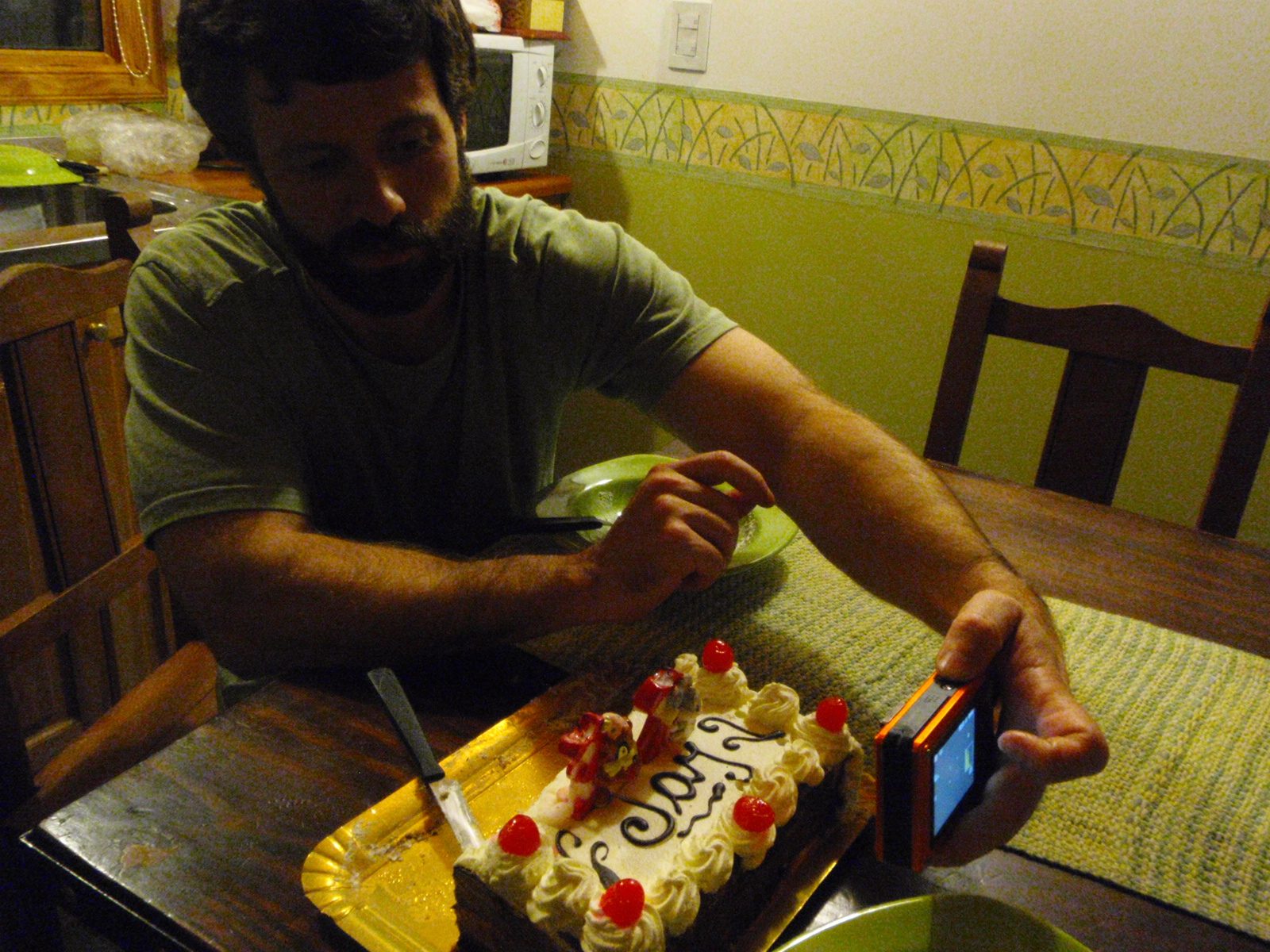 Jay photographing the cake.