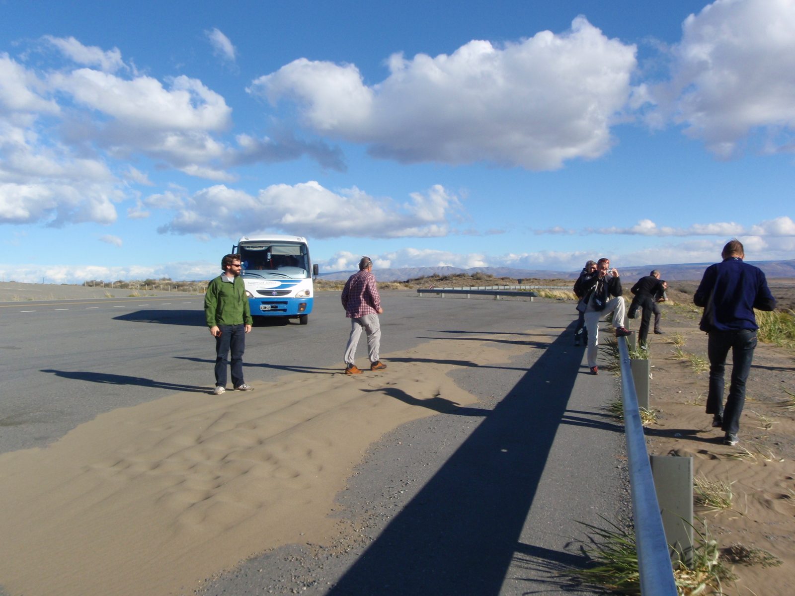 Stopping the bus to check out a giant ice berg that had run aground.  It was still too far away...