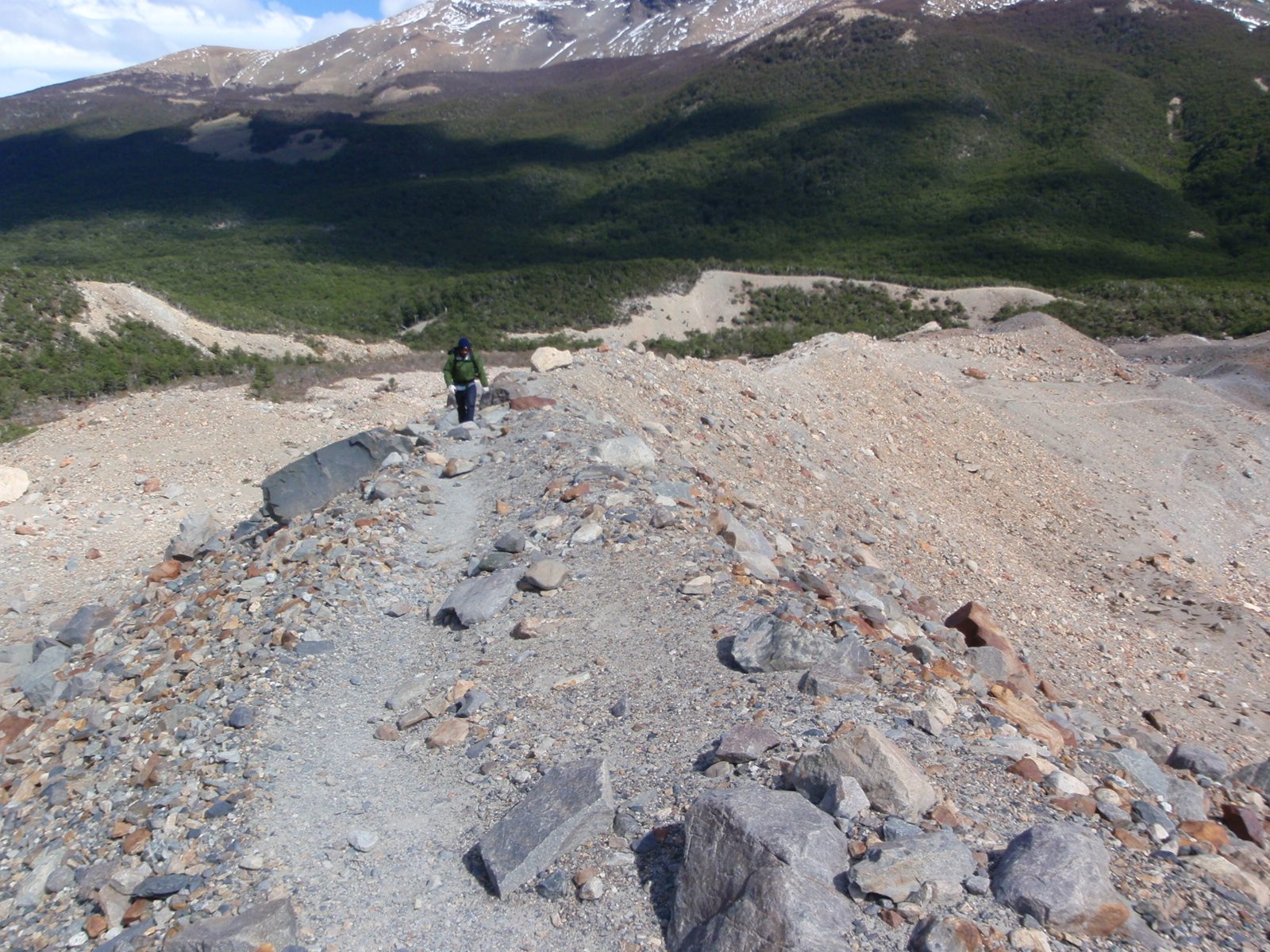 Jay hiking up an exposed ridge line to get a better view of the glacier.  It was so windy you...