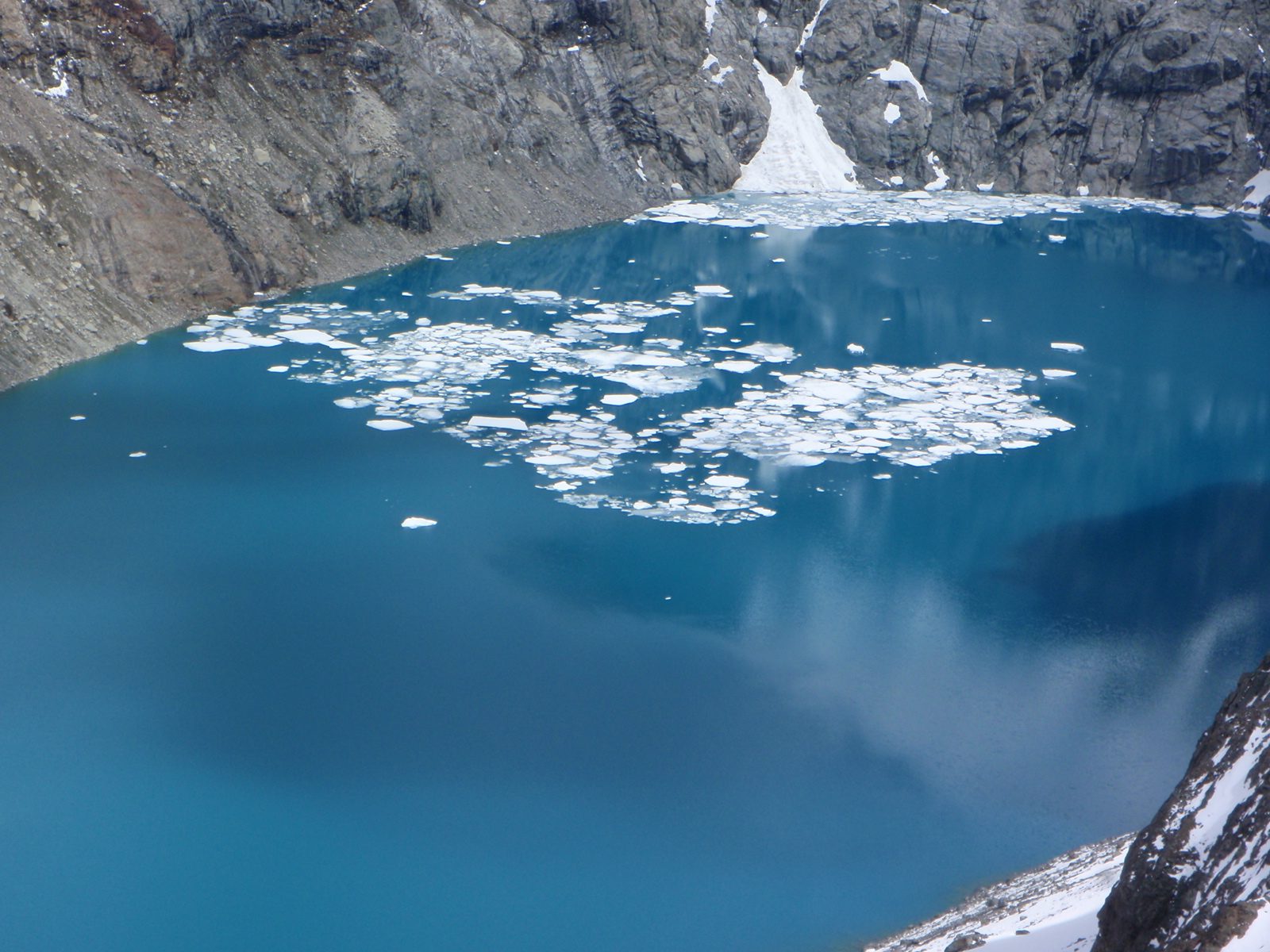 What a bizarre color.  These icebergs had all fallen from the glacier above.  Jay would later...