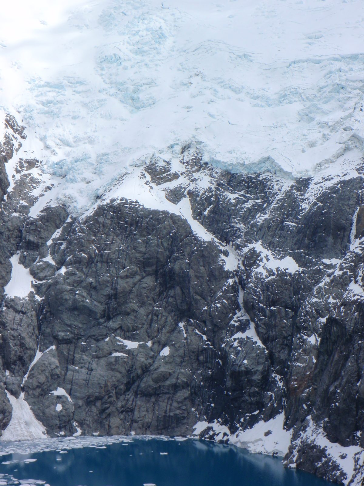 View of the seracs lying just above the lake.