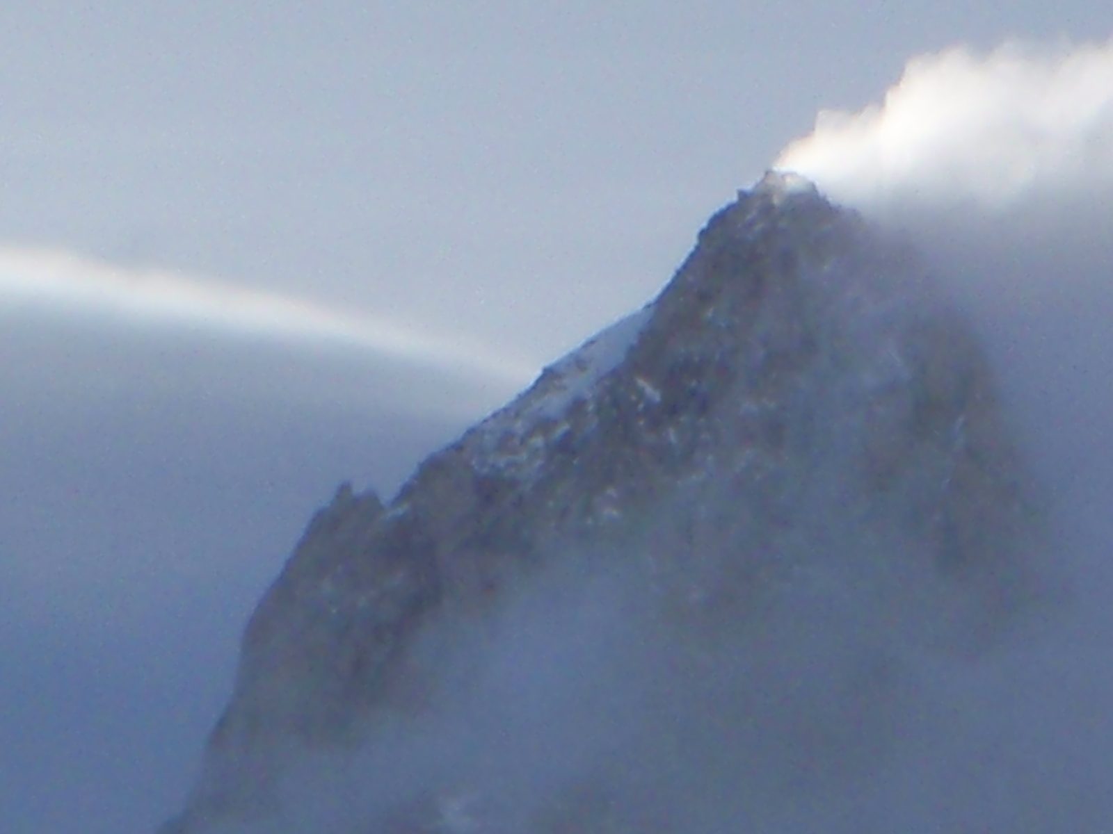 Trying to zoom in even further to capture detail at the summit.  The sensor on my camera shows a...