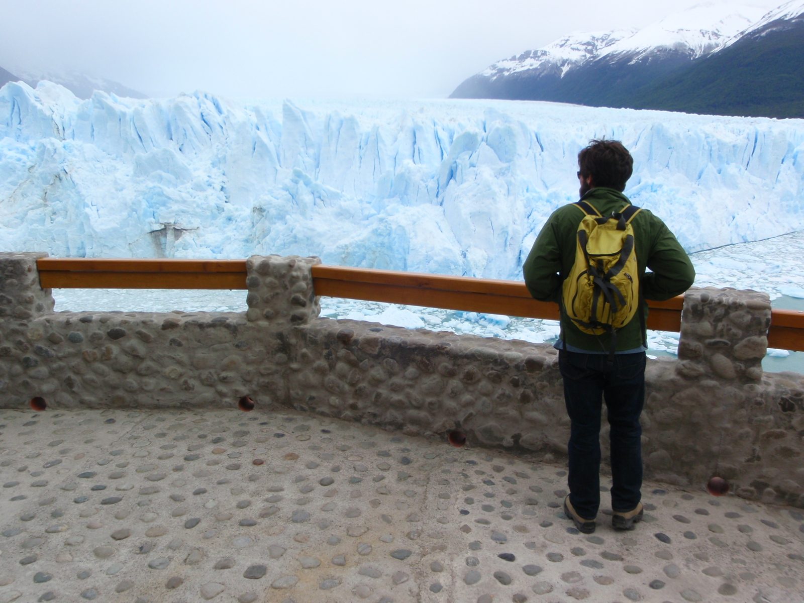 Jay, watching the glacier carefully for more calves.  Listening was no help, because of the...