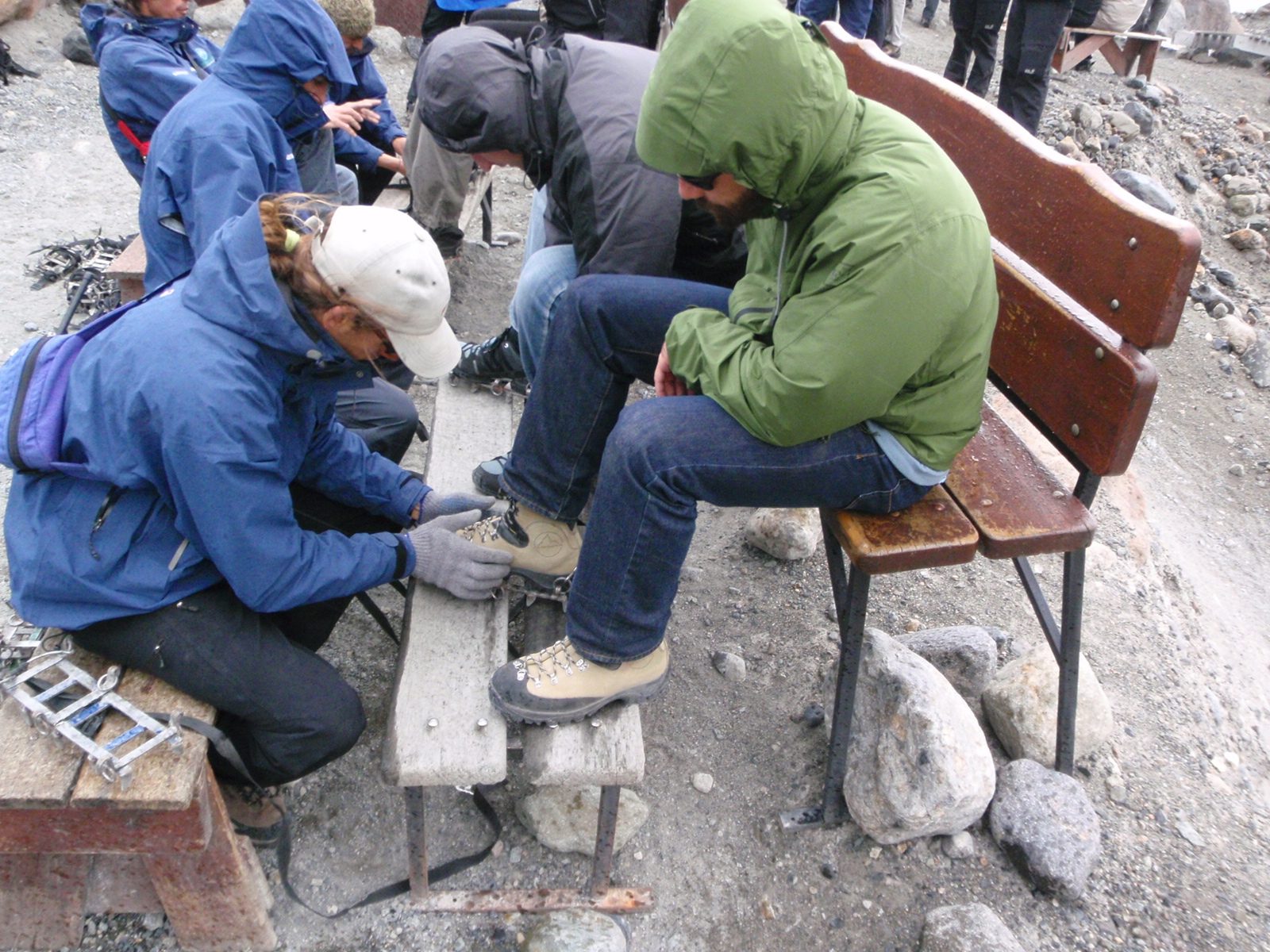 Jay gets fitted for crampons.