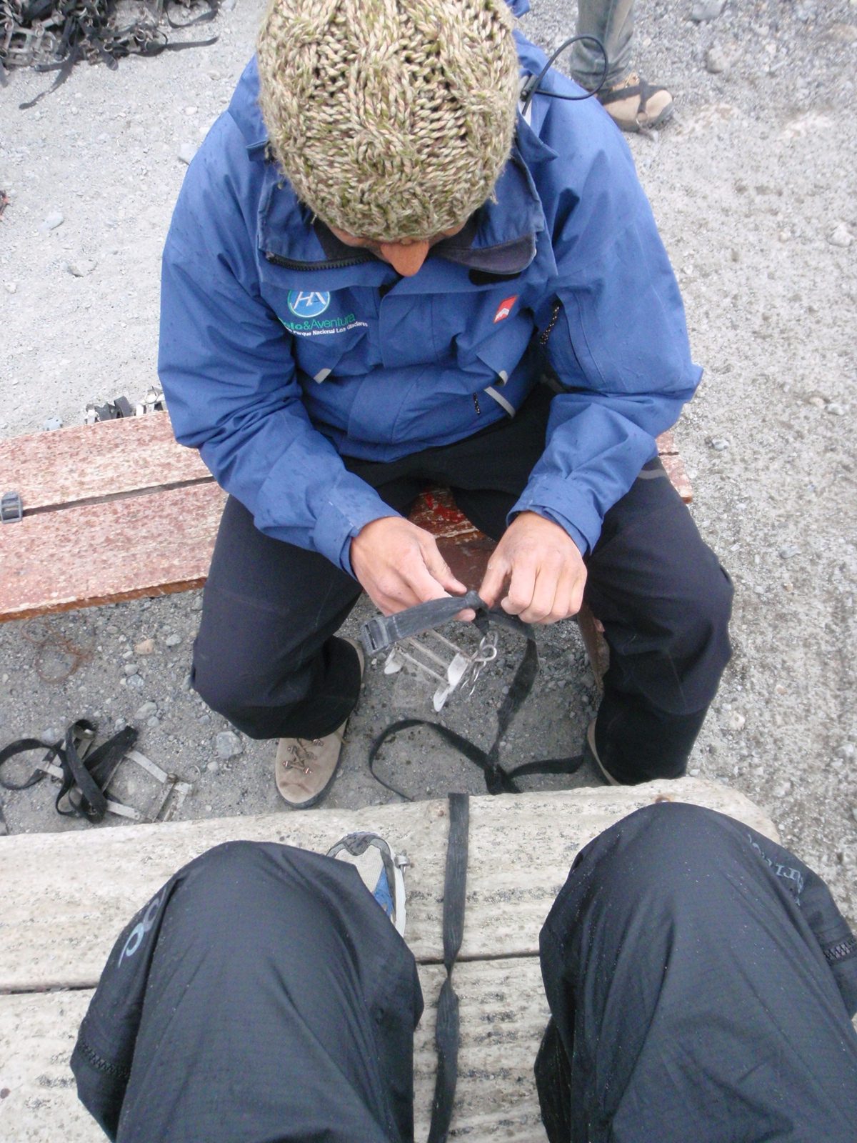 Our guide puts some crampons on my running shoes. Sweet!