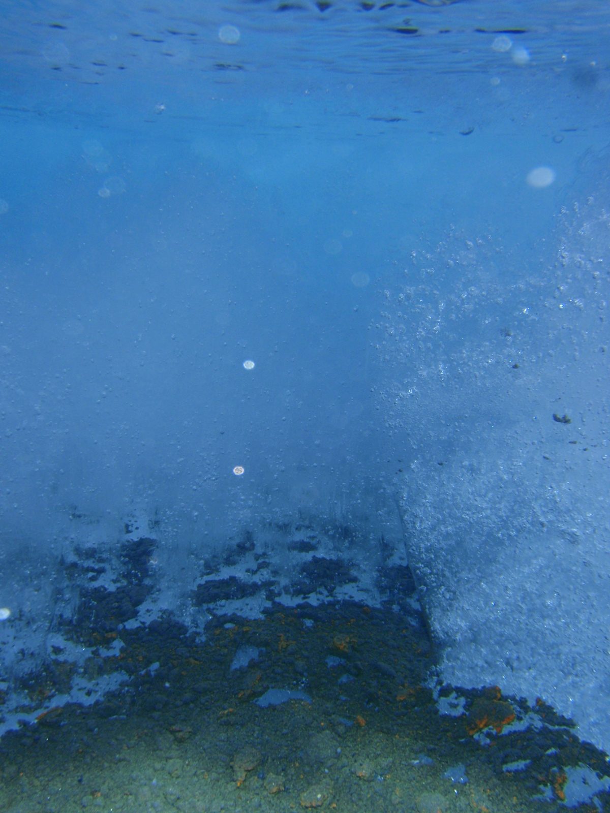 Underwater dirt on top of the glacier.