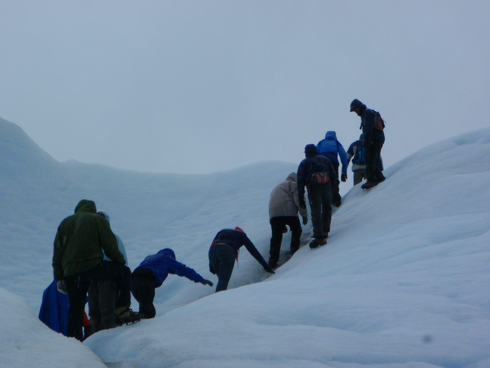 Our guides help us over a particularly steep ridge.