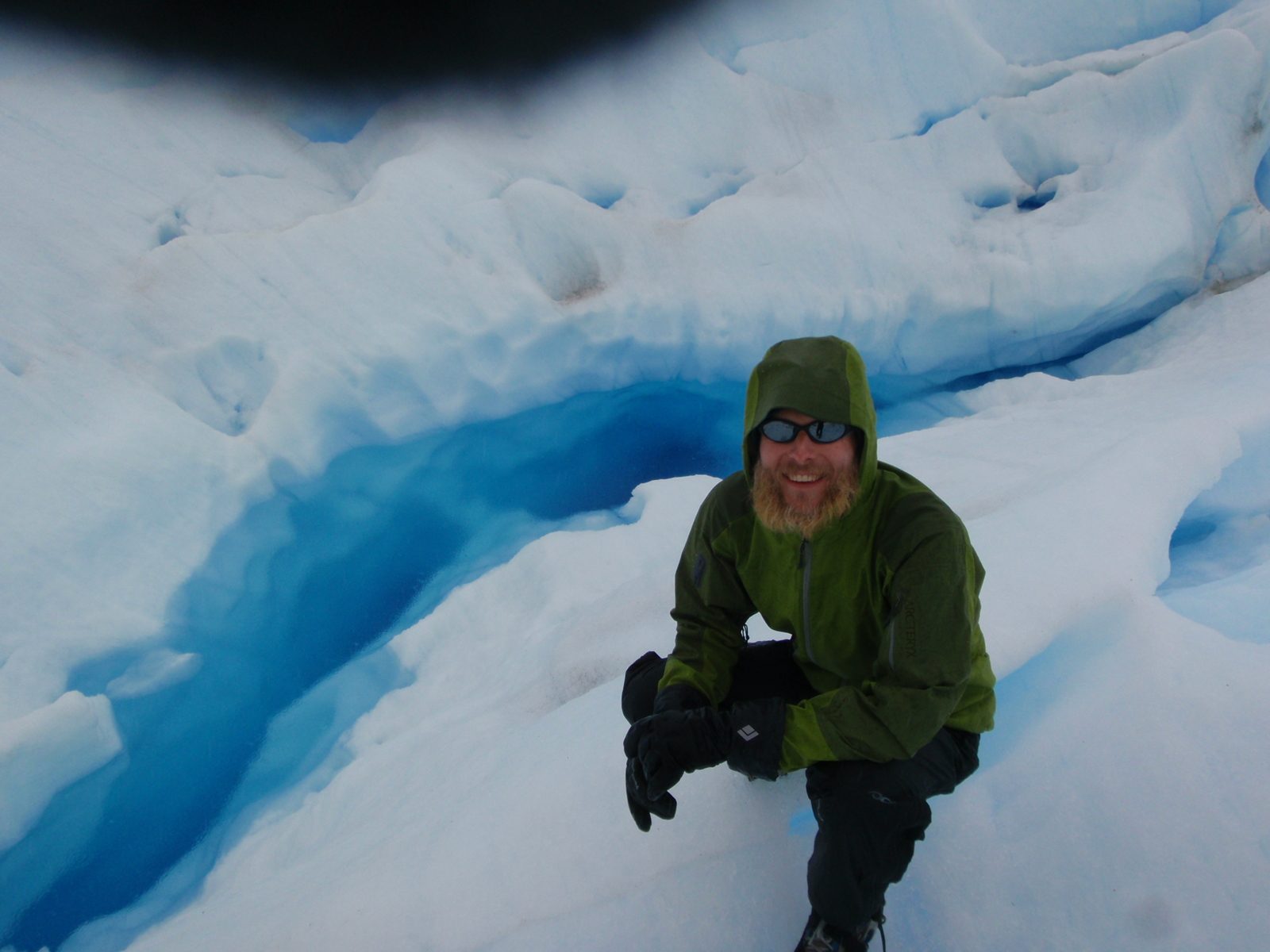 John next to a big flooded crevasse.