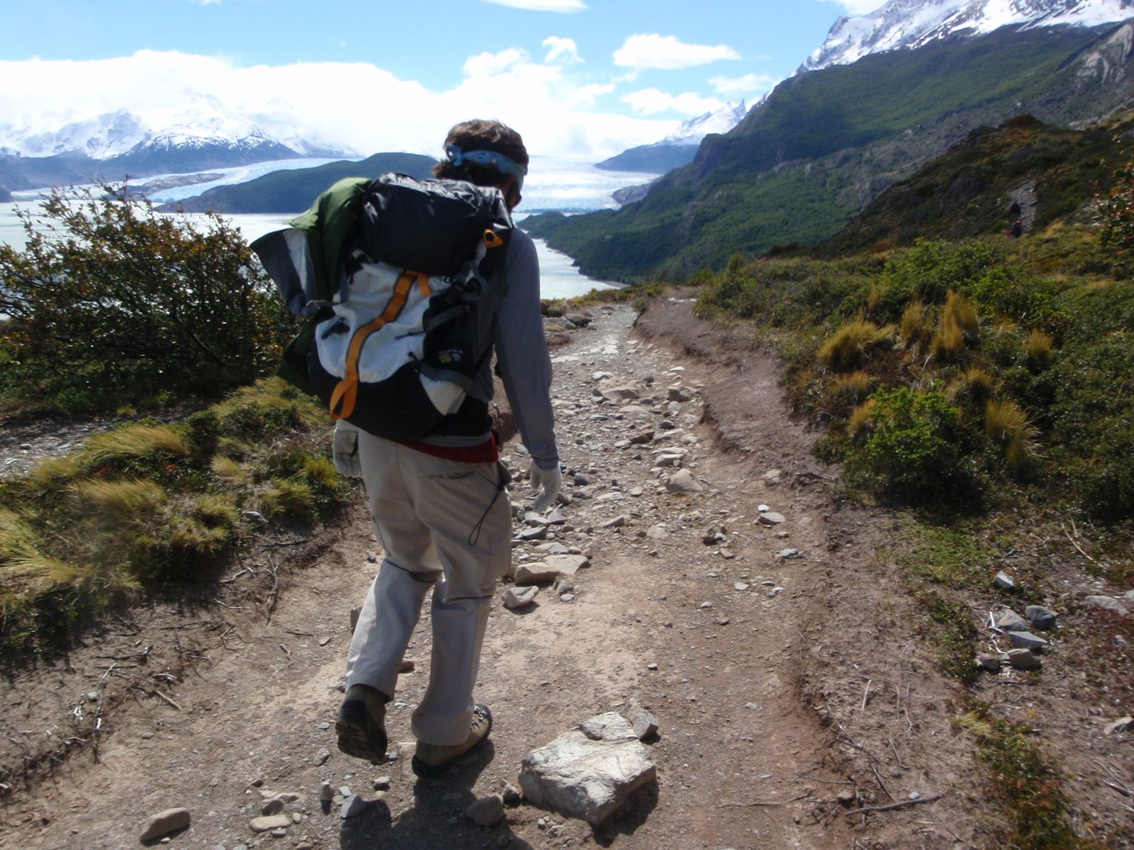 Jay cresting a hill giving us a good view of Glaciar Grey in the distance.