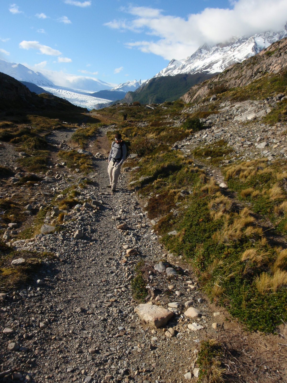 Jay hiking back to camp in the afternoon sunlight.