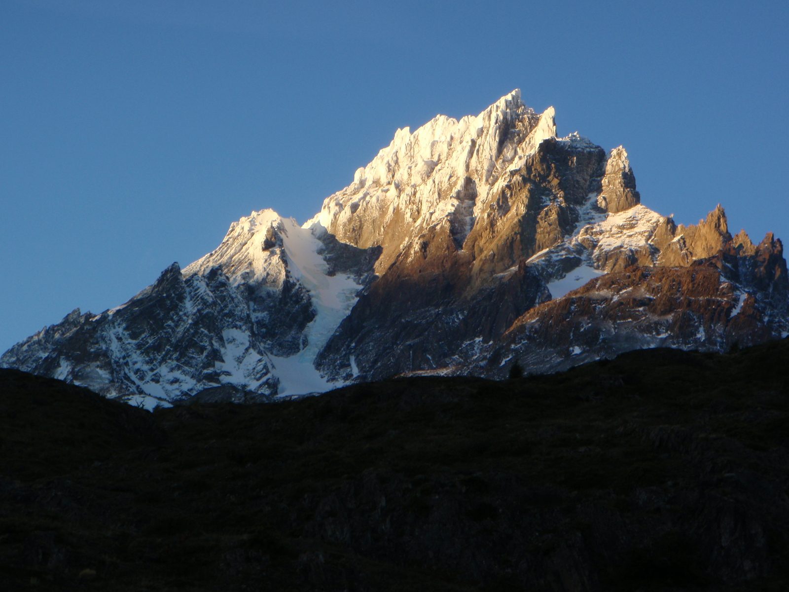 As the sun sets we get some alpenglow on the mountains.