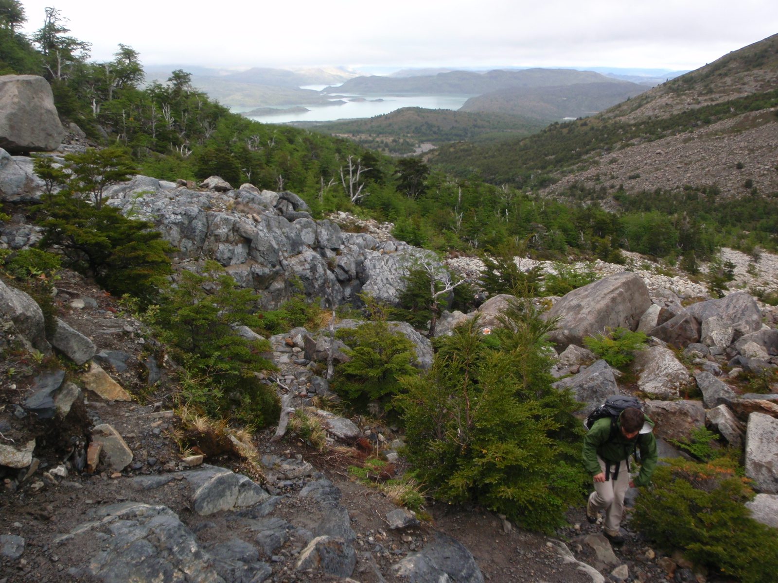 Jay climbing higher up Valle Del Frances, with Lago Nordenskjold in the background.
