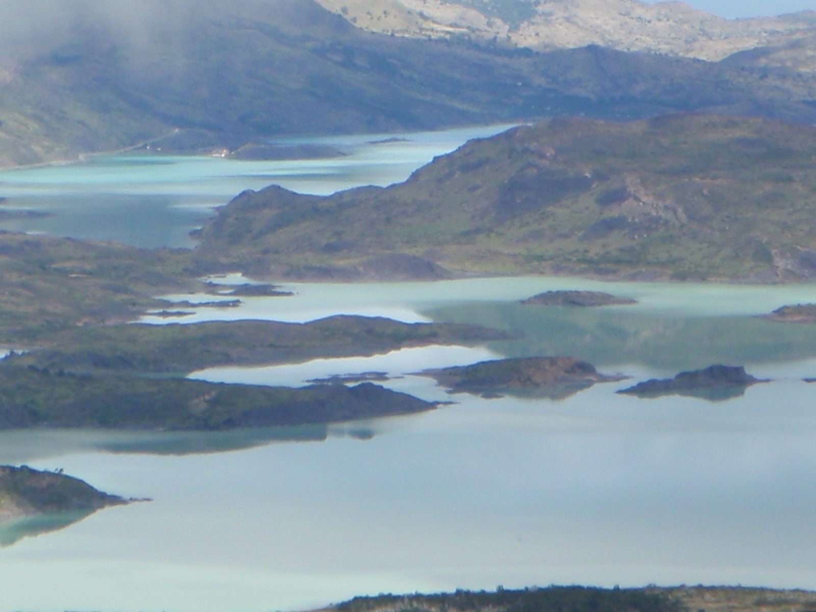 Close up shot of the wild colors reflecting off the lakes. I think the one in the background is...