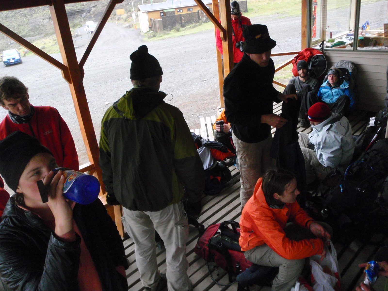 Hanging out at the (thankfully covered) bus stop with other backpackers. About 5 minutes before...