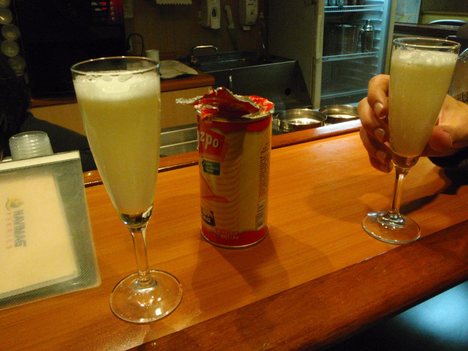 Pascal and I get a few rounds of pisco sours as well as some Kryzpo potato chips.
