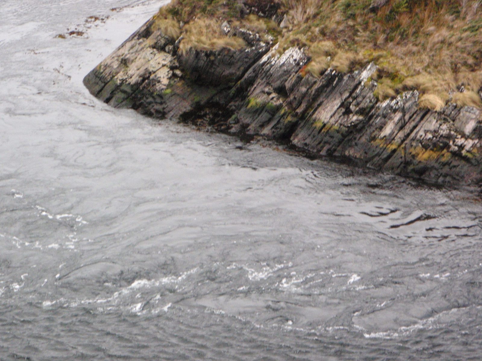 Turbulence near shore where it is relatively shallow. I found it amazing a 100m ship could do...