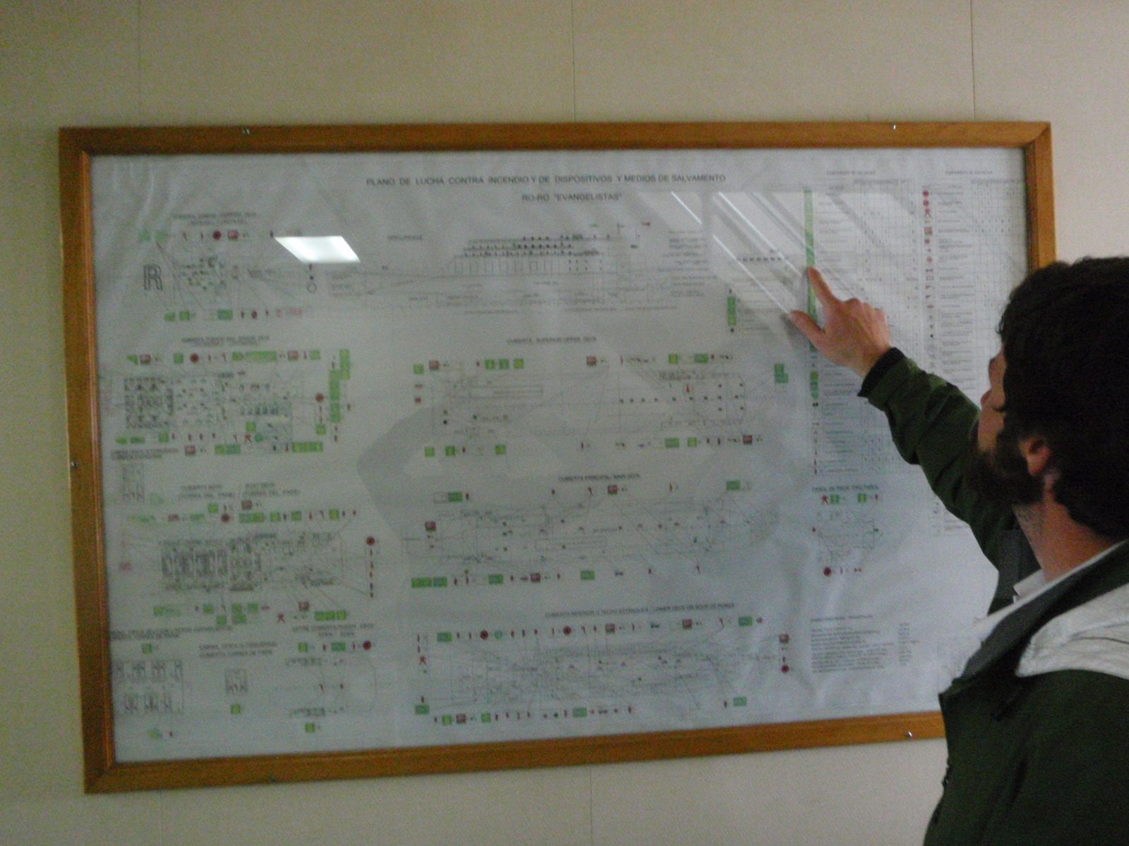 Jay, looking at a map of the ship.