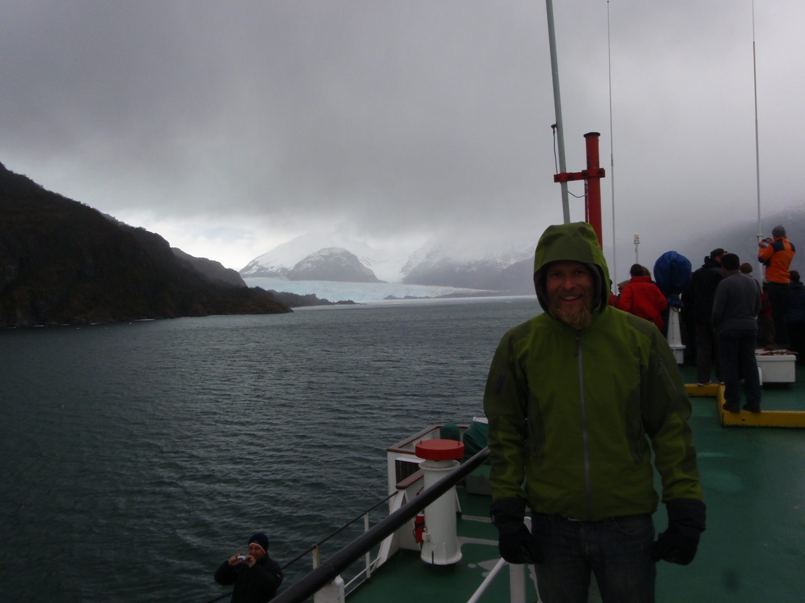 Weather gets a bit rainy as we make a short detour into a bay to see a particularly beautiful glacier.