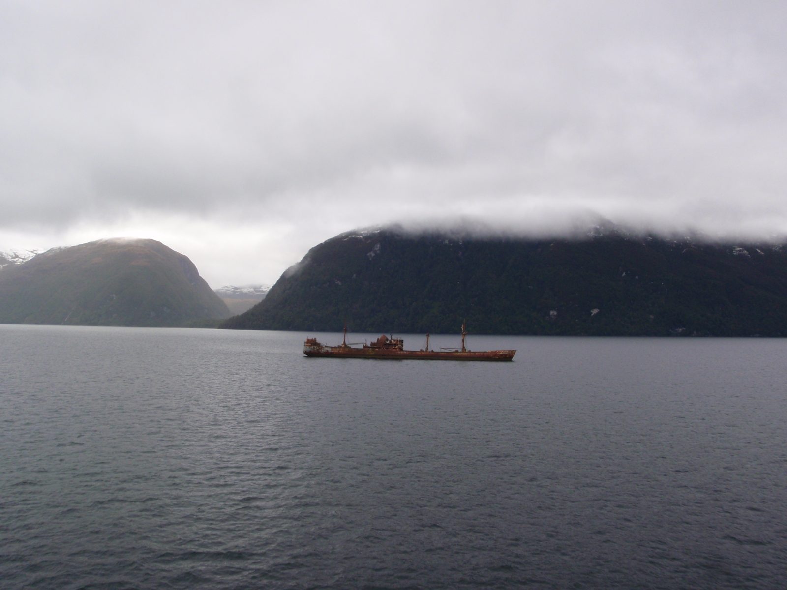 Someone ought to go hang some jolly rogers from this ship's masts. The low fog and mist, coupled...