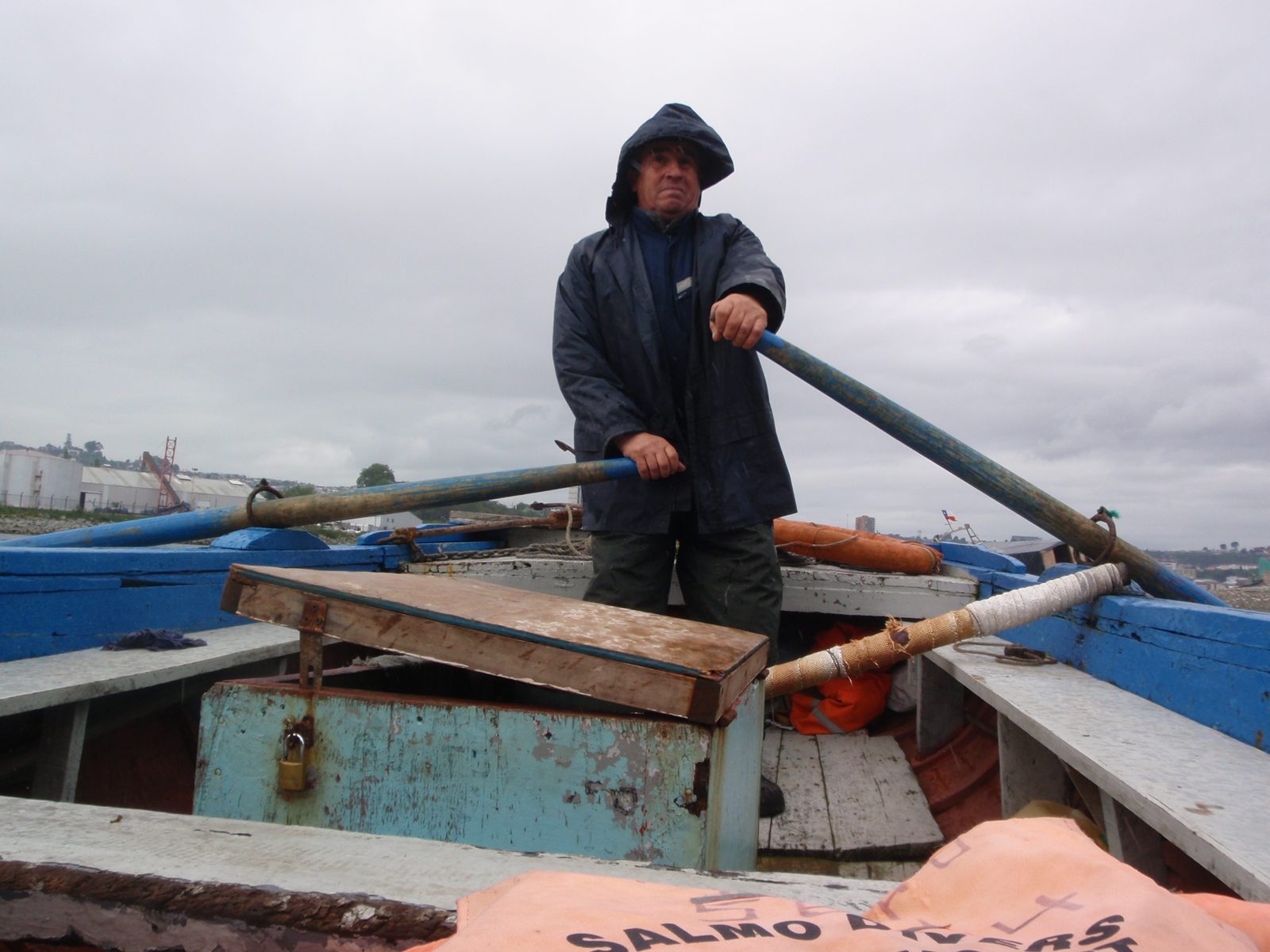 Our captain romantically enough used oars to ply the waters of the small harbor in Puerto Montt....