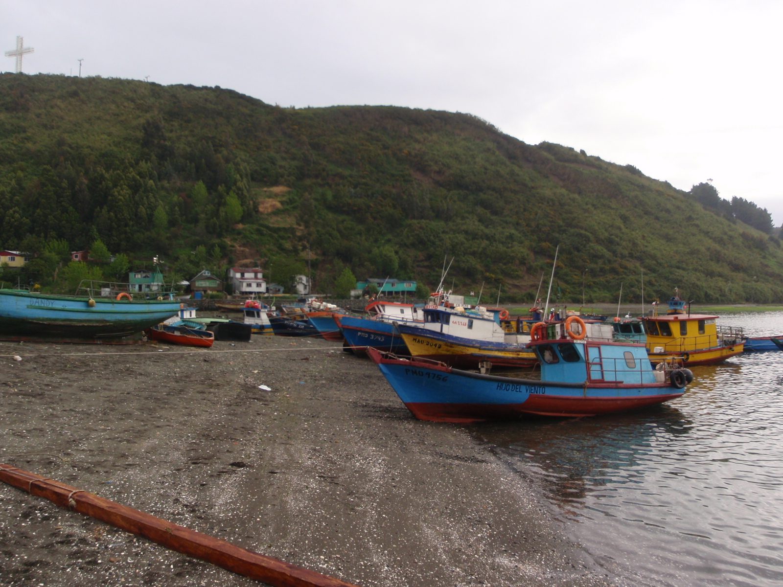 Fishing boats on an island in the harbor of Puerto Montt.