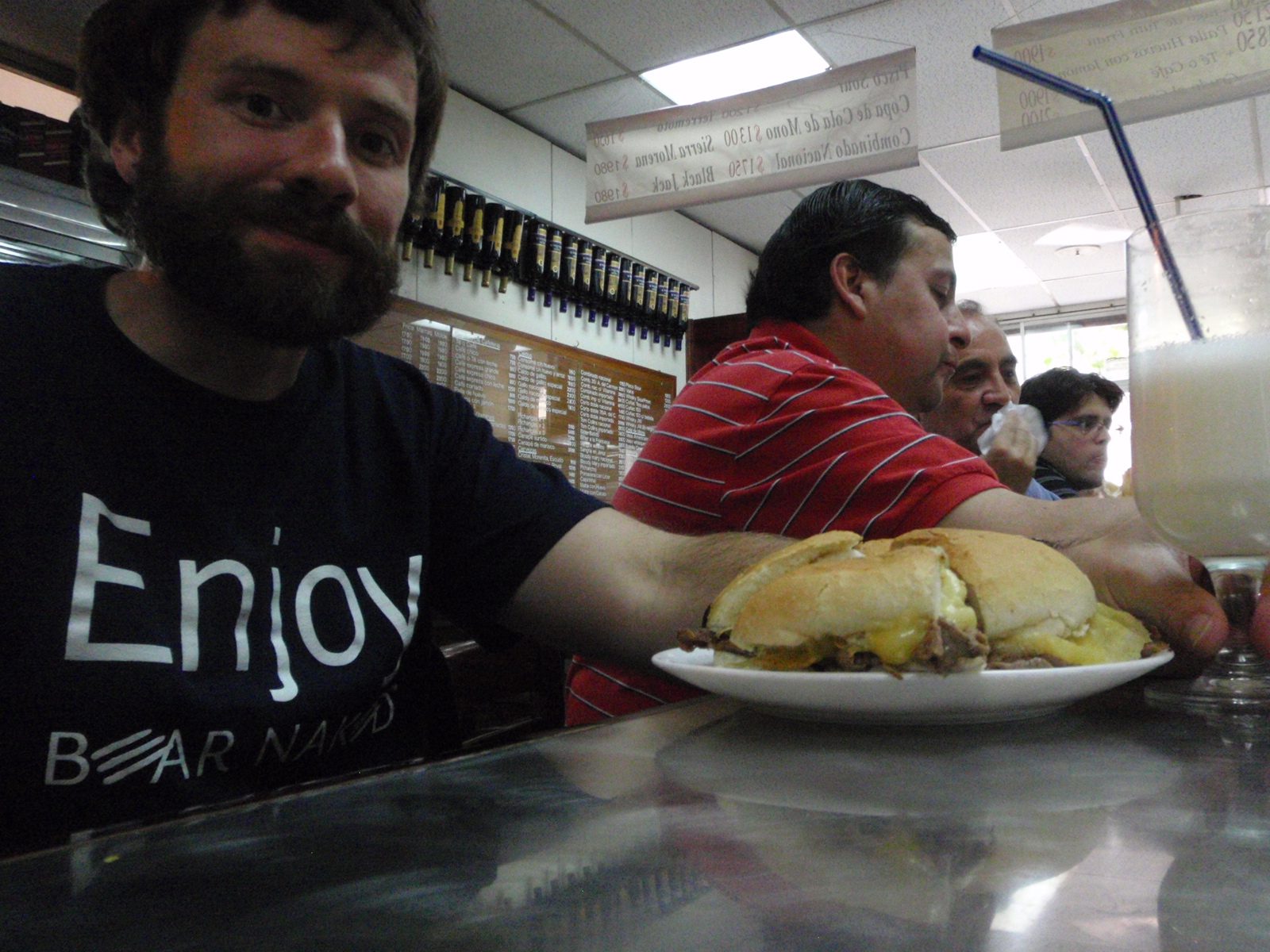 Lunch at a neighborhood sandwich counter. Jay with his trusty lomo de bistec sandwich.