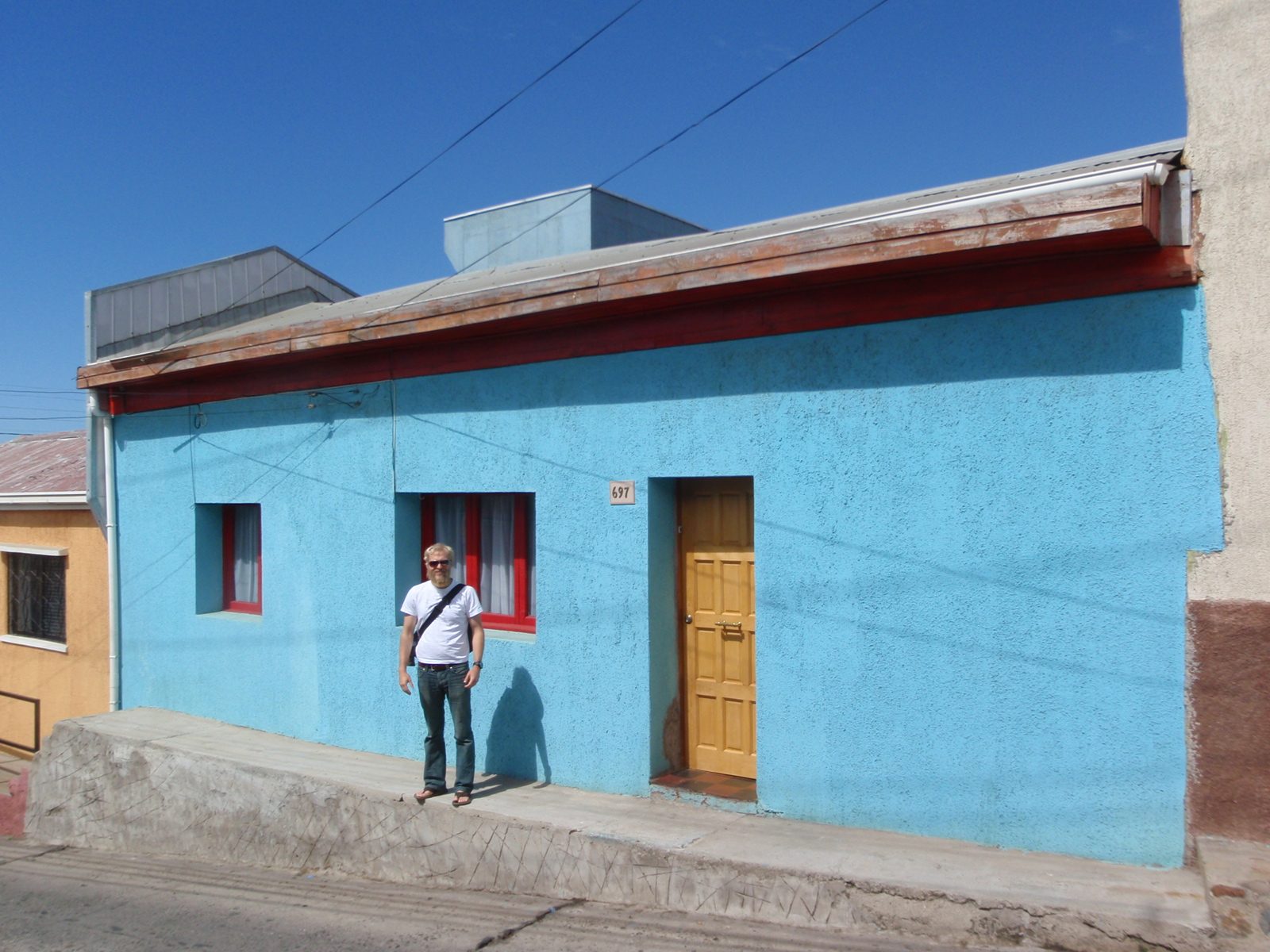 John with a colorful house. I really liked the way all these houses were painted.