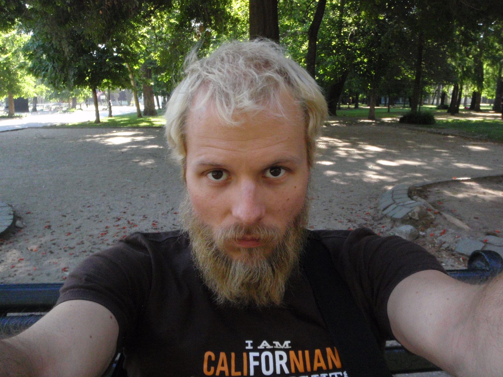 John goes on a walk through Parque Quinta Normal, while Jay goes back to the hostel to get some rest.