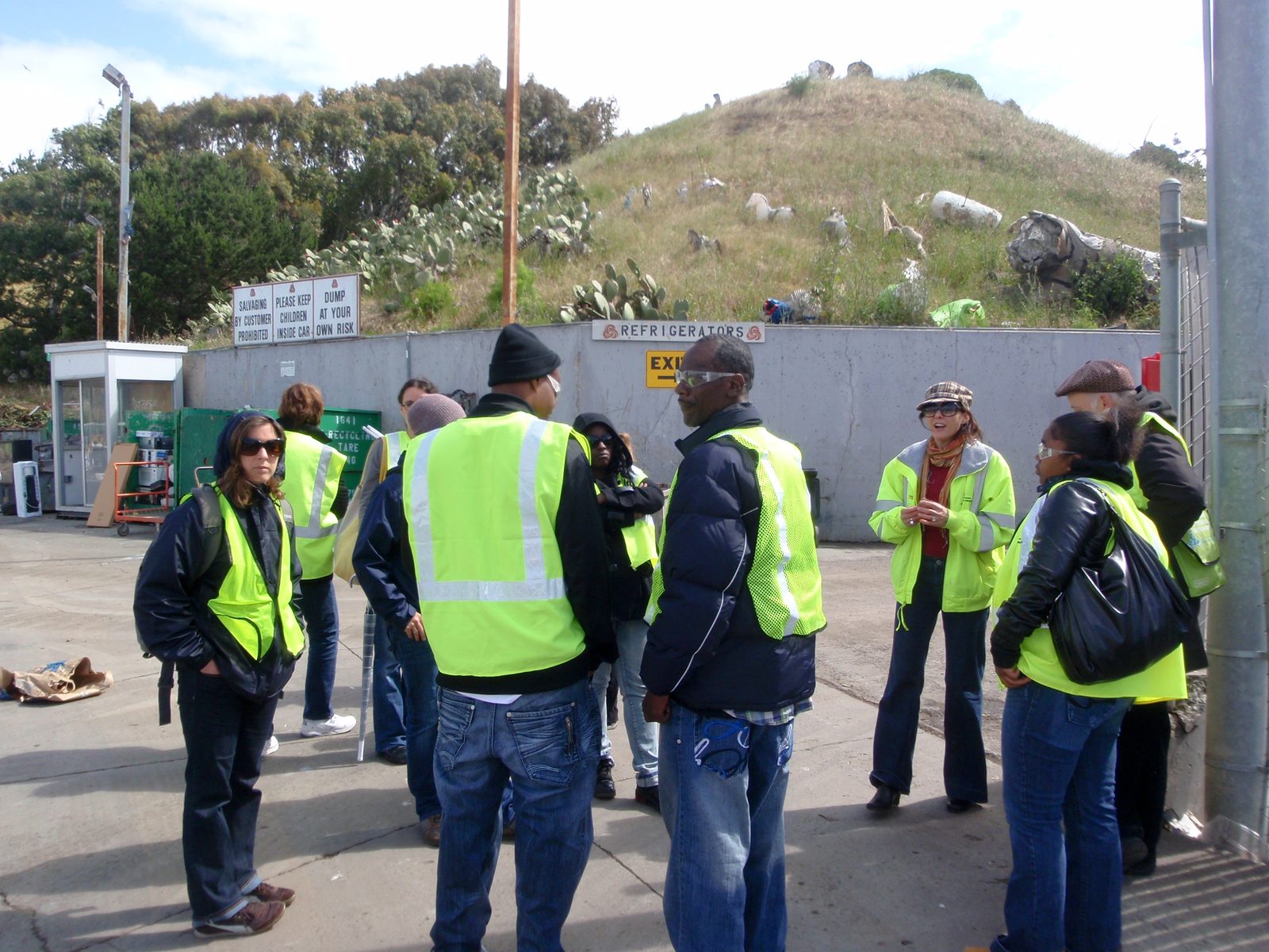 Waiting with other members of the tour group to go see where the contents of our black trash...