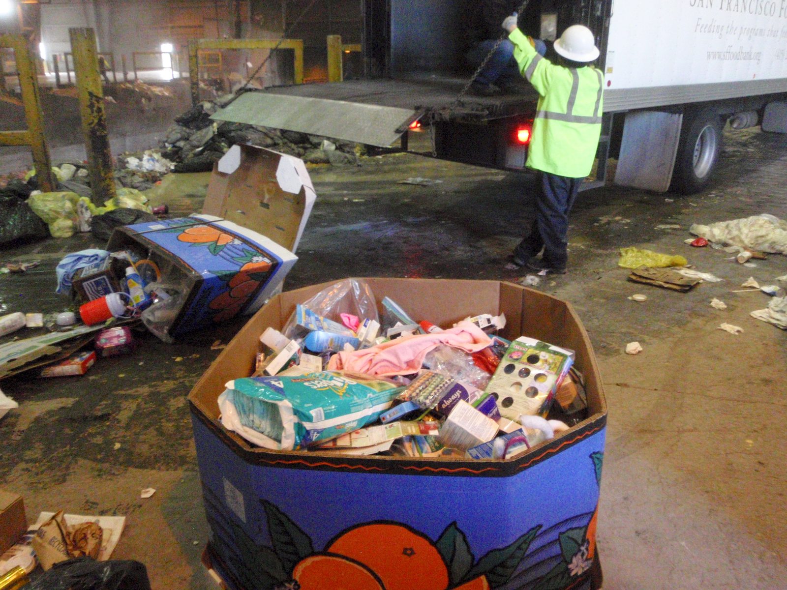 Here's an almost brand new bag of baby diapers and several hundred pounds of food that they...