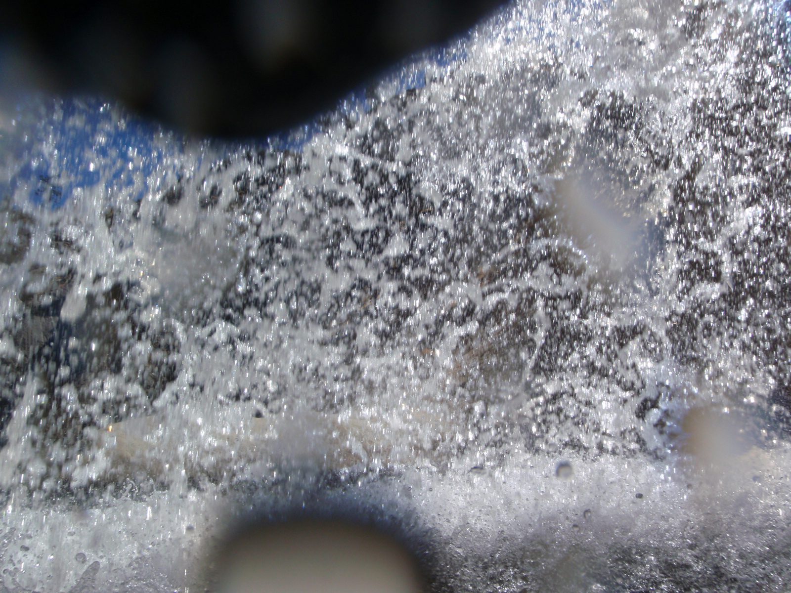 Catherine takes a shot from, apparently, inside a waterfall.  The secret here is to use your...