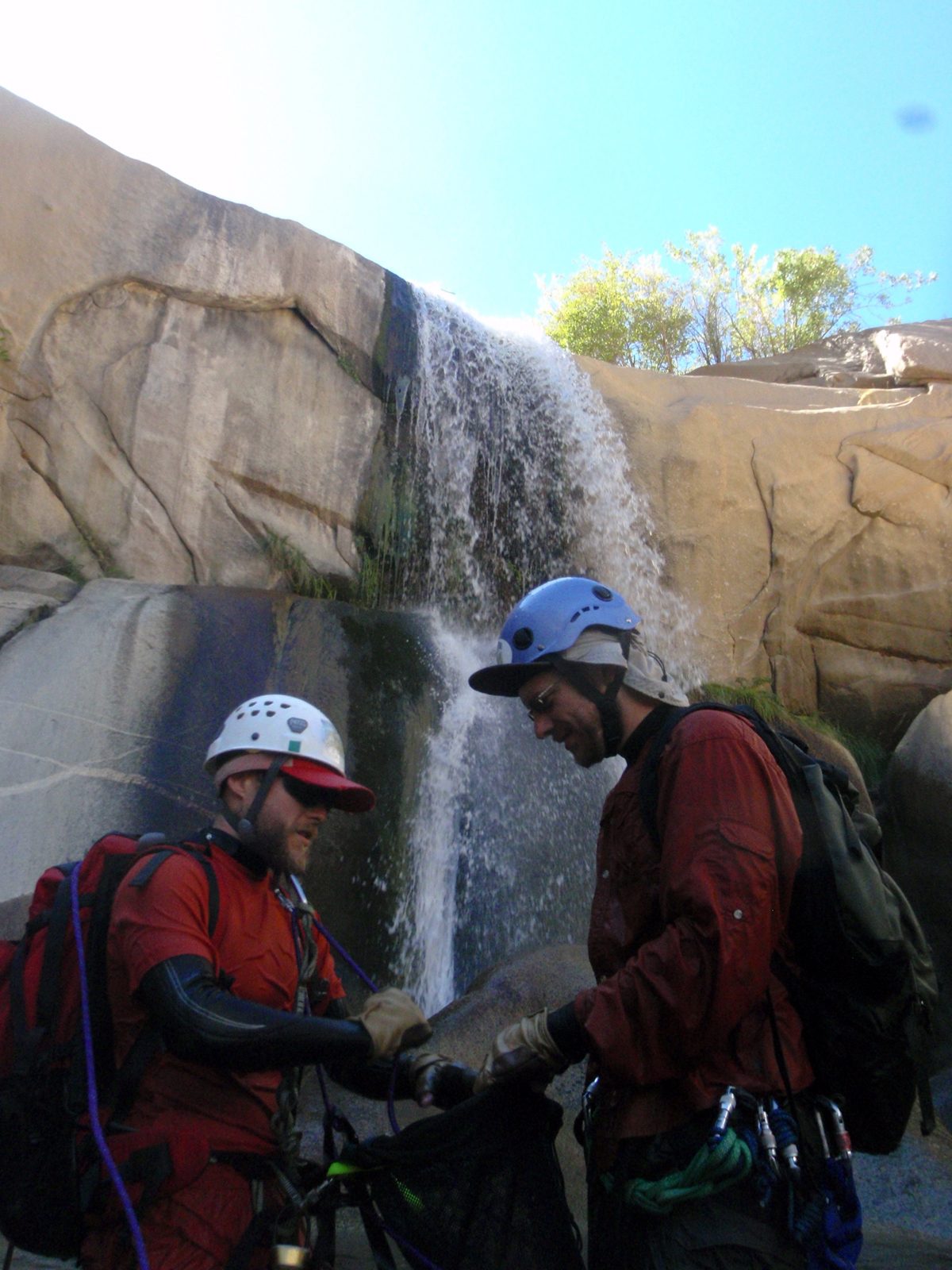 John and Joel stow the rope after the 60 foot rappel.