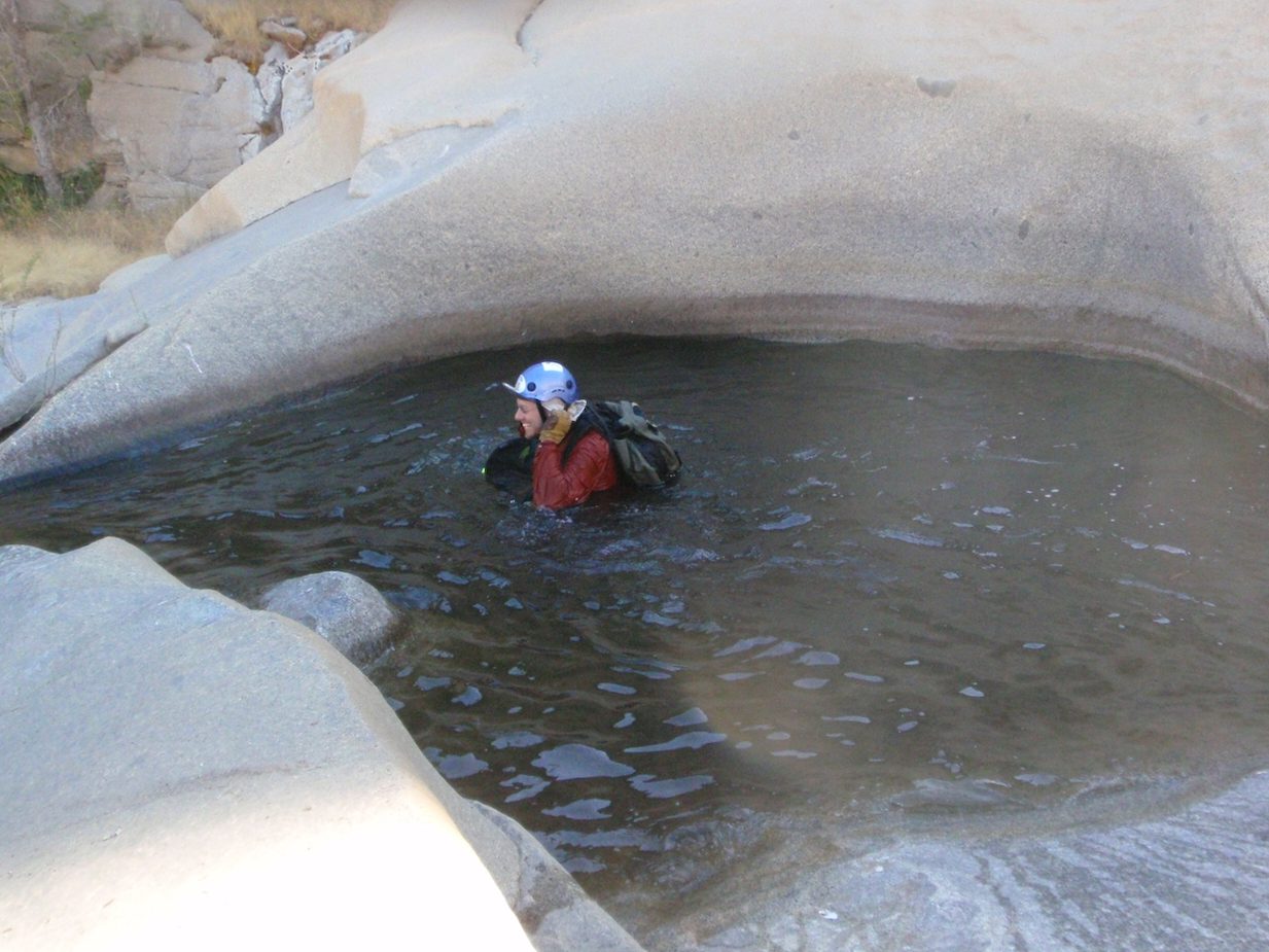 Joel, swimming down canyon.  At this point, we are past the Seven Teacups proper, but still have...