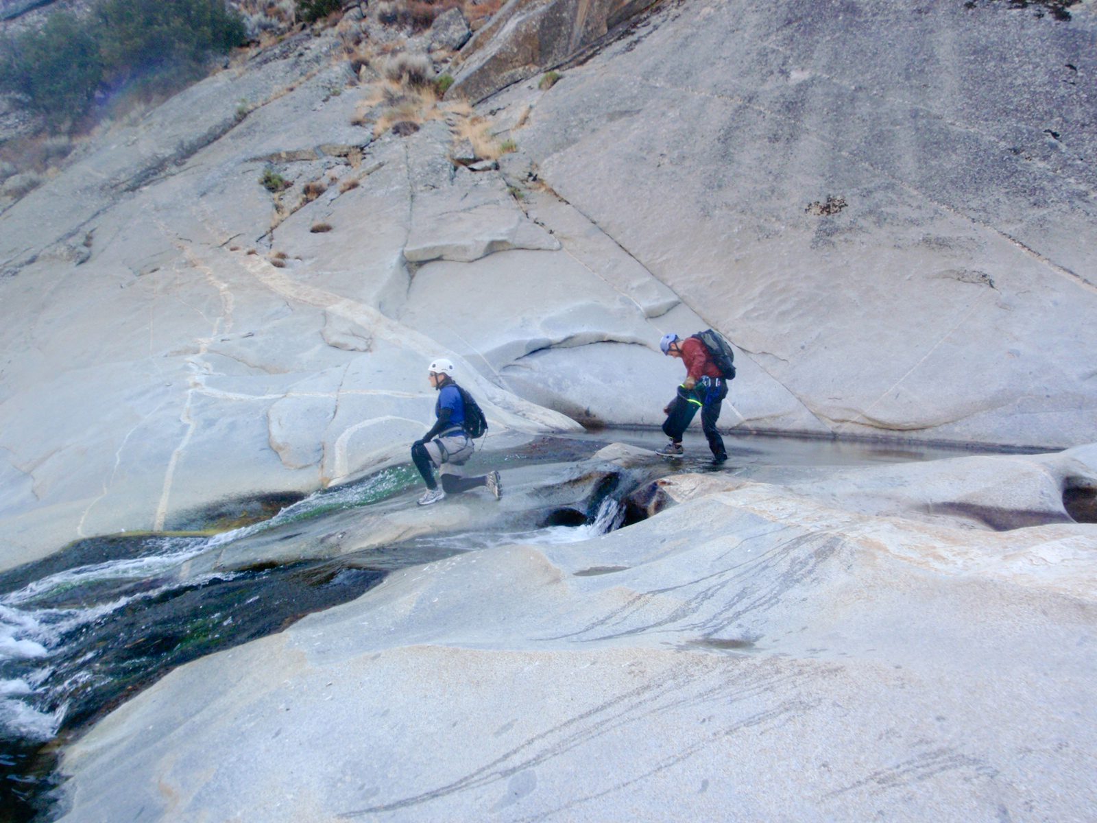 Catherine, getting ready to slide down the last slide in canyon, which deposits directly into...