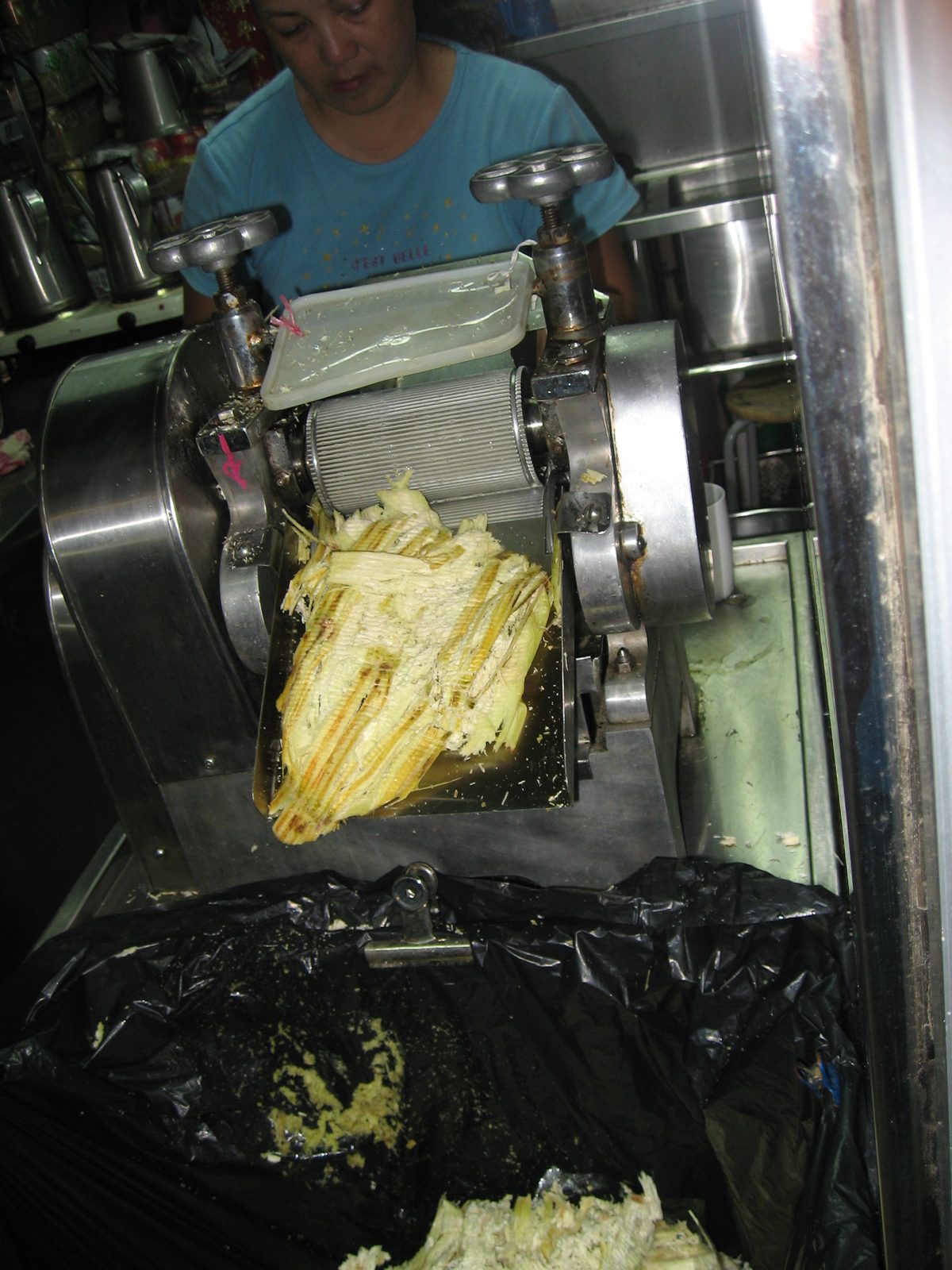 A machine that makes sugar cane juice out of sugar cane.  Much easier than making your teeth do the work.