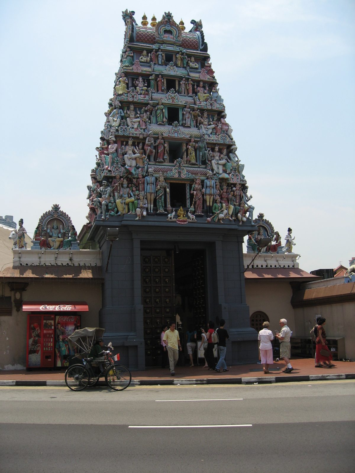 Apparently Hindu temples tend to be quite a scene with plaster of paris figurines and tall...