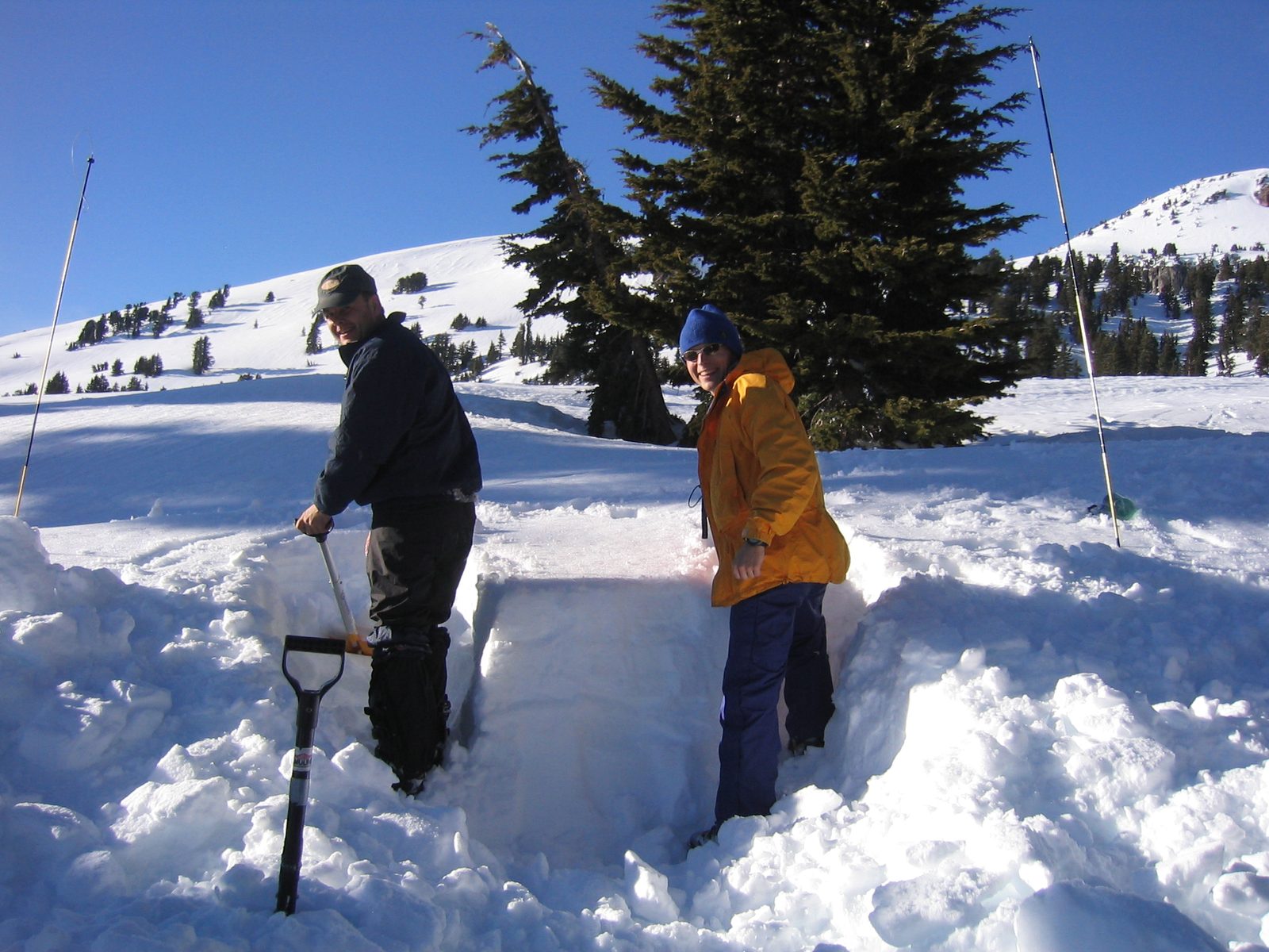 John and Niels dig a snow column to learn about avalanche safety.