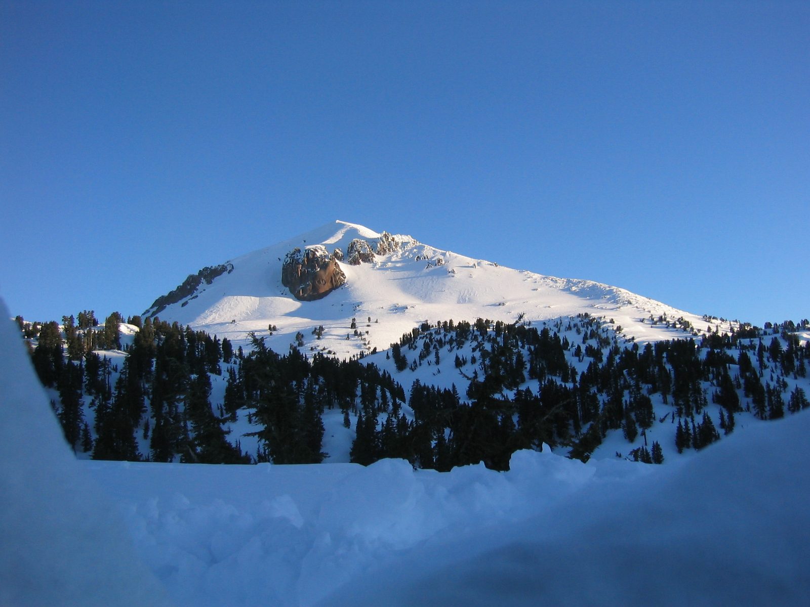 Sun rise against Lassen Peak, as viewed from John's snow cave.