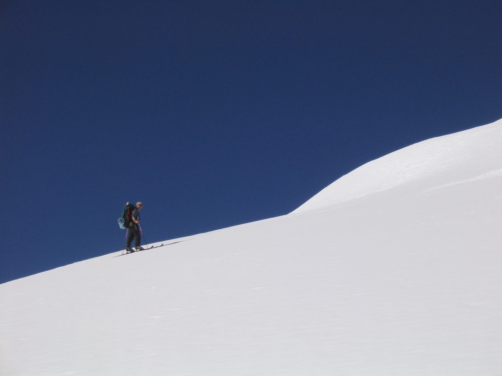 Lance, pausing for a moment, to survey the moonscape-like terrain on upper Lassen peak. 