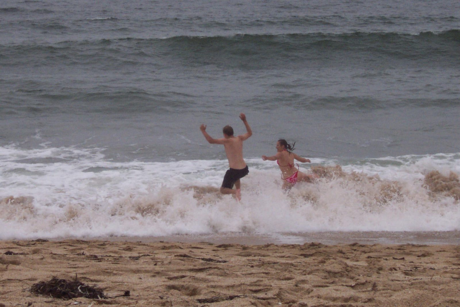 John and Tini "swim" in the Pacific Ocean.  If by "swim" one means "get breath knocked out of...