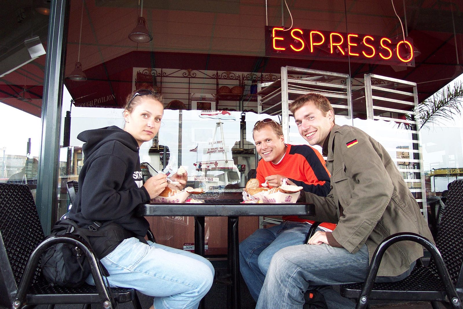 Tini, John, and Stephan eat clam chowder near Fisherman's Wharf.