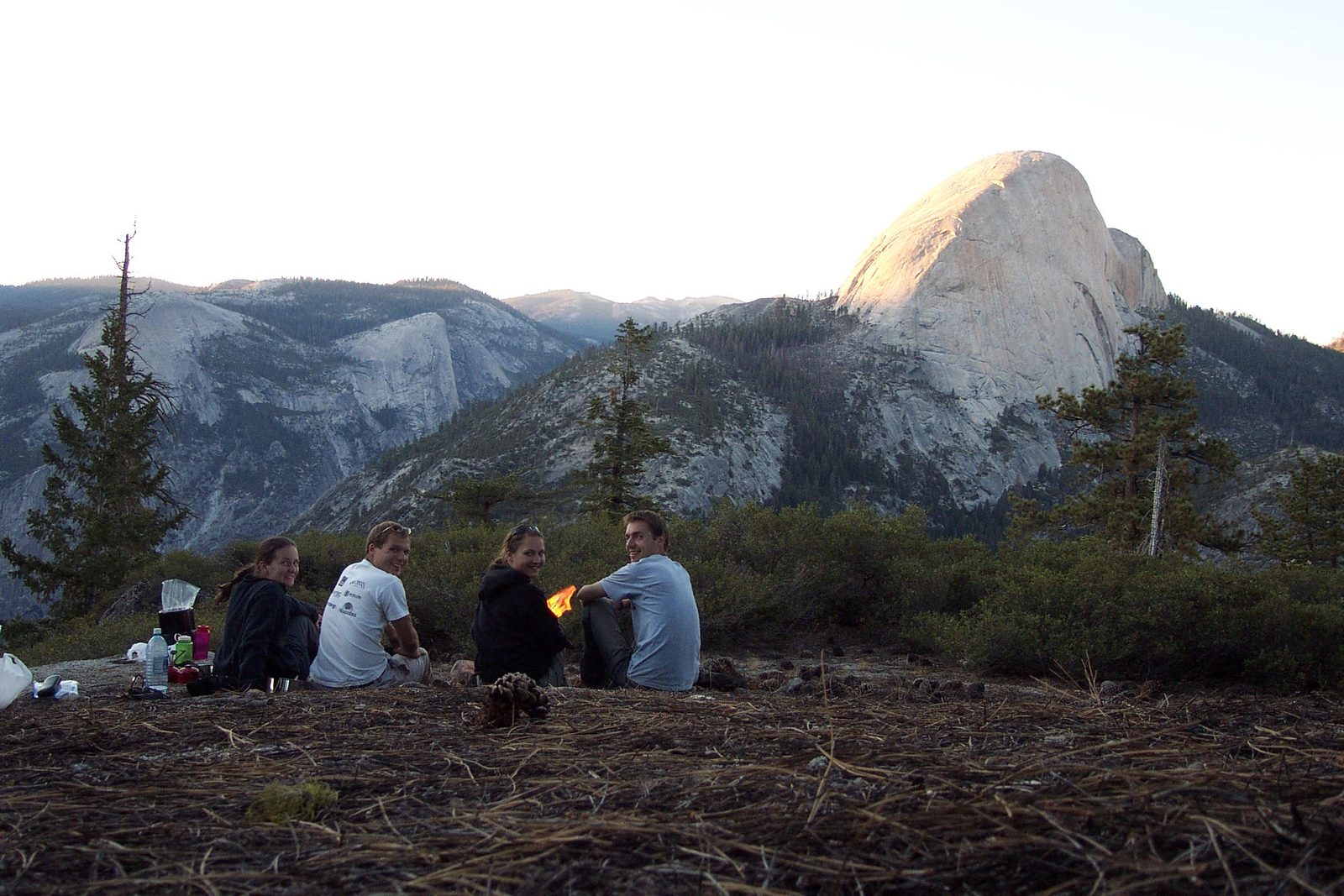 Group photo.  Rachel, John, Tini, and Stephan.  Half Dome in the background.
