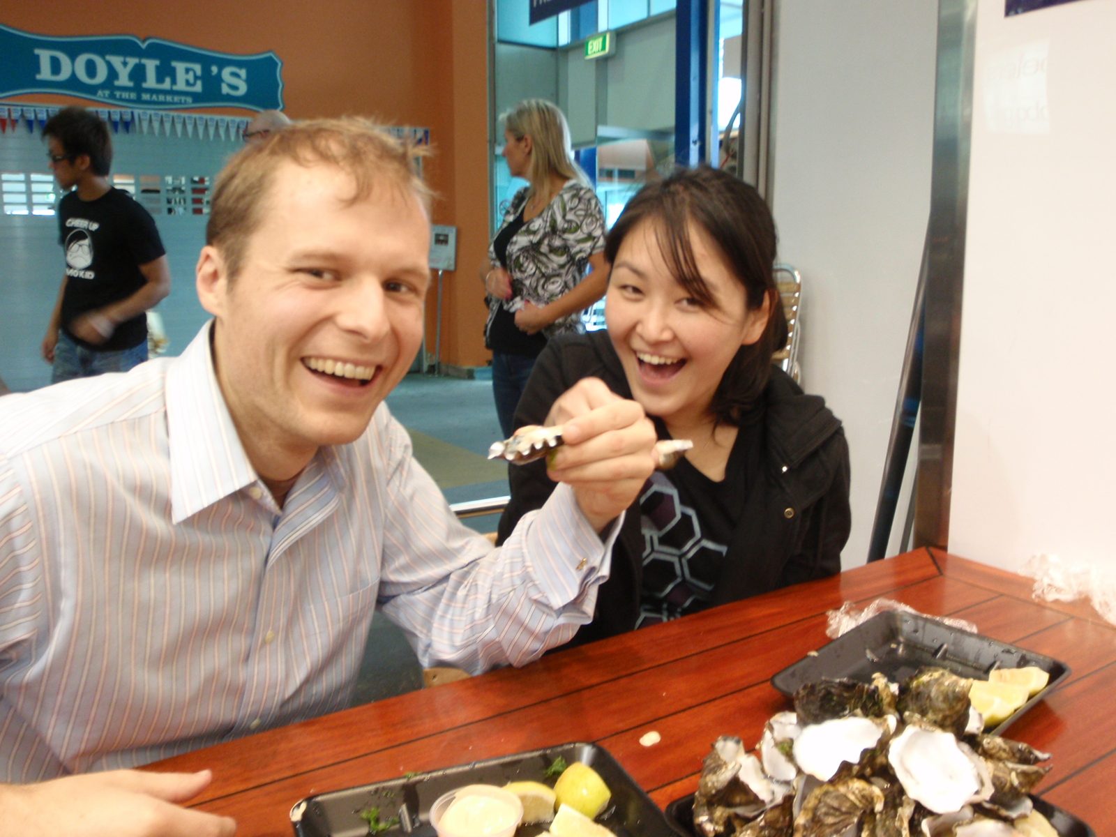 Still excited to be eating oysters (notice the growing pile of shells).  I think we are on dozen...