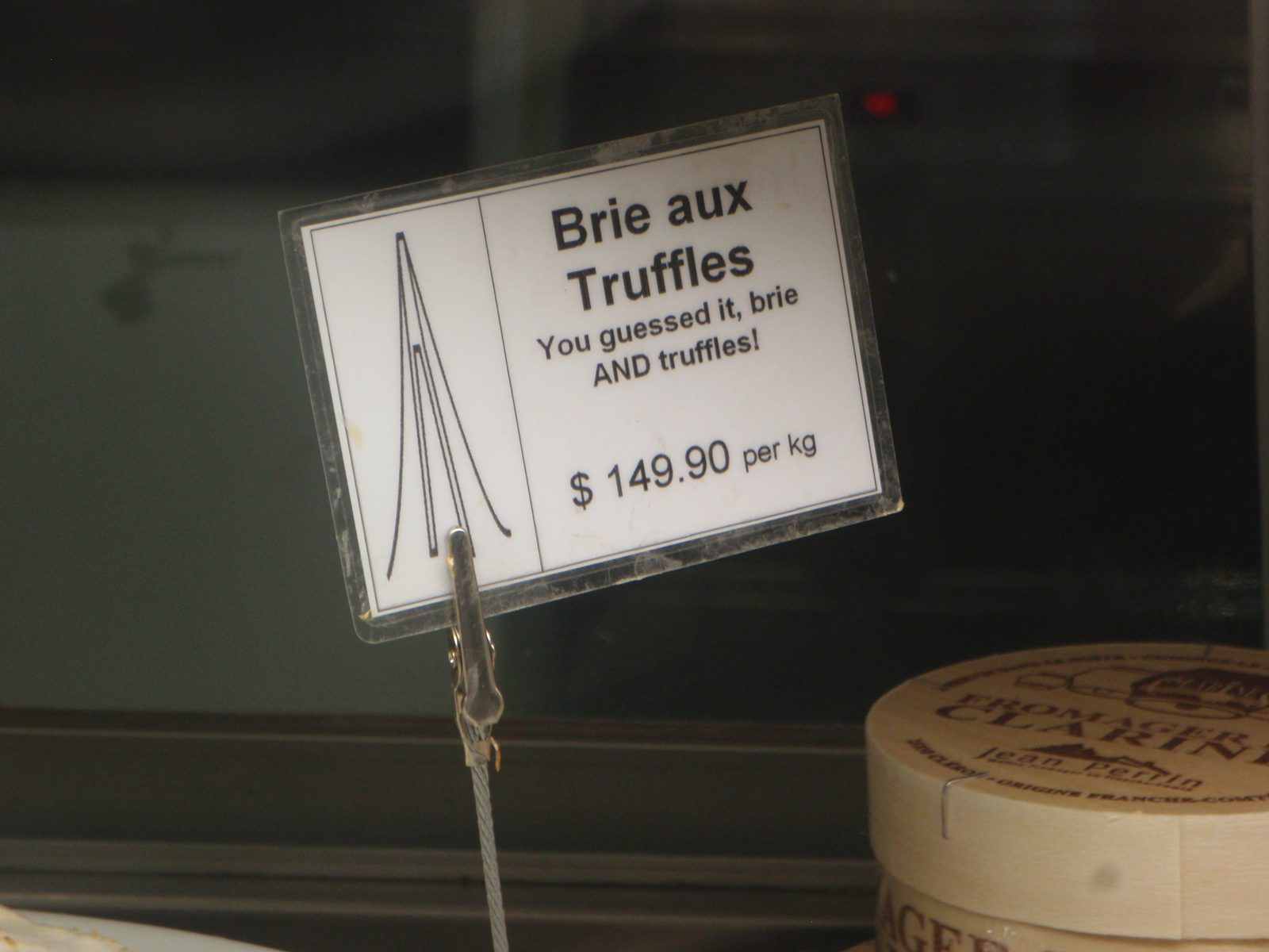 Yikes! That's some expensive cheese.  In American Standard units, about $50 USD / lb.