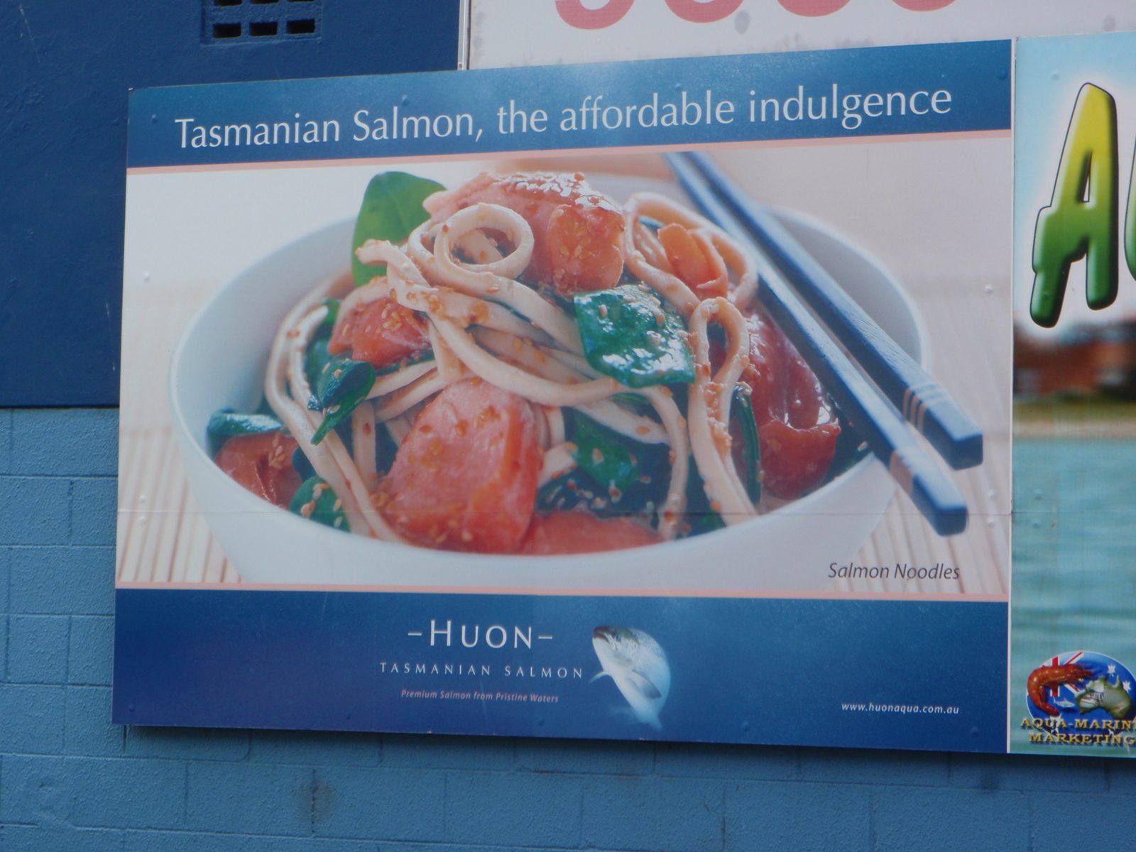 Mmmm... affordable indulgence.  A sign outside the Sydney Fish Market.