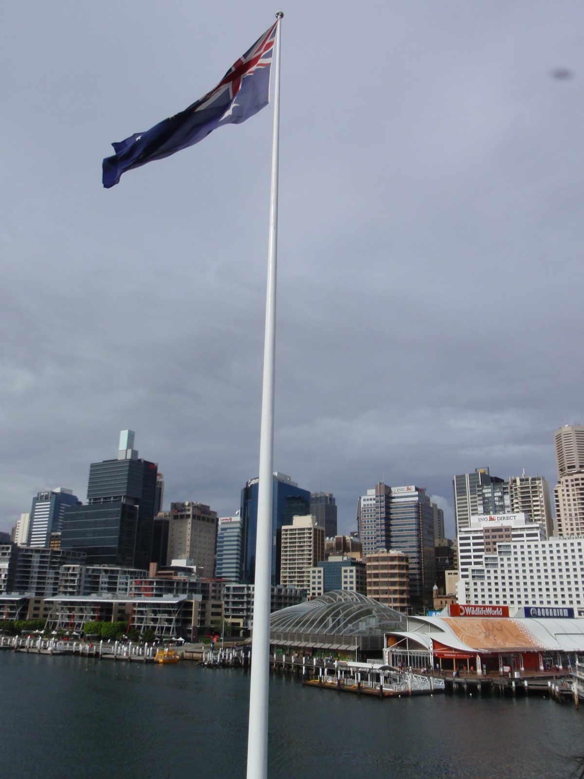 An Australian flag, flying over Darling Harbour.