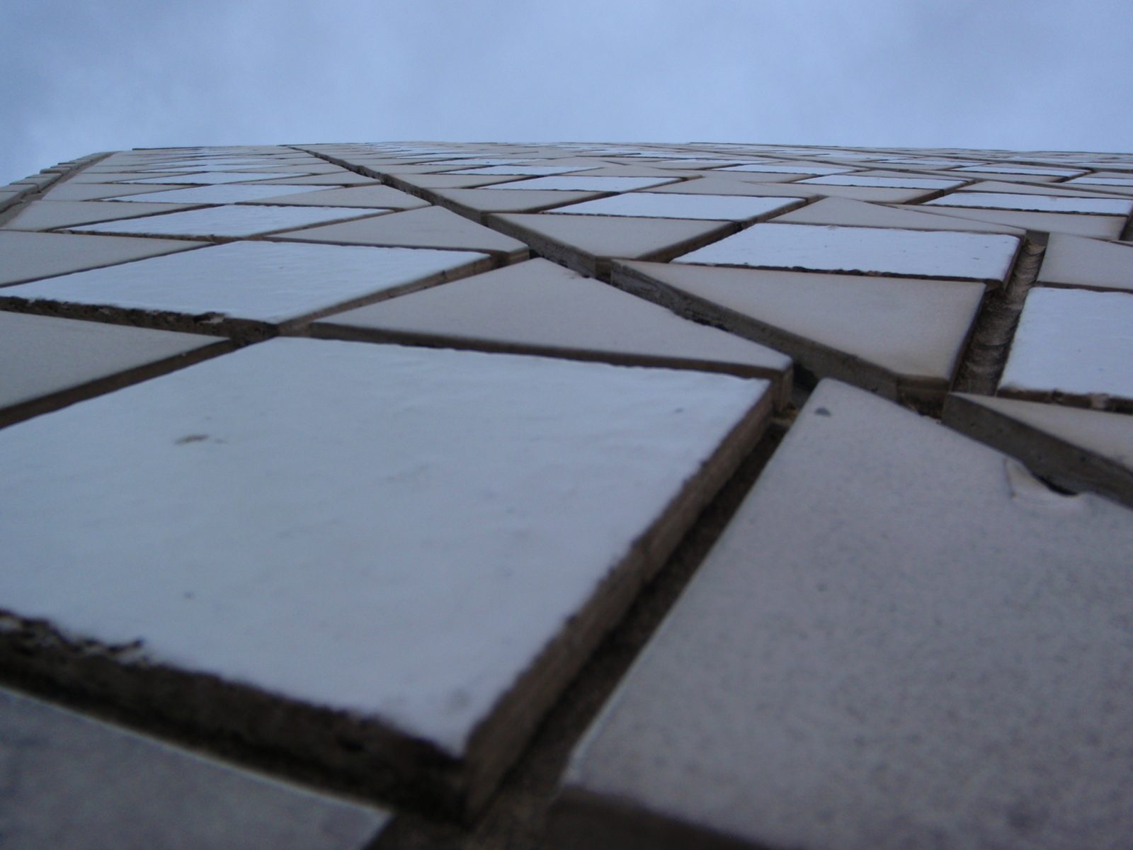 A close up view of the ceramic tiles that cover the Sydney Opera House.  As an interesting...