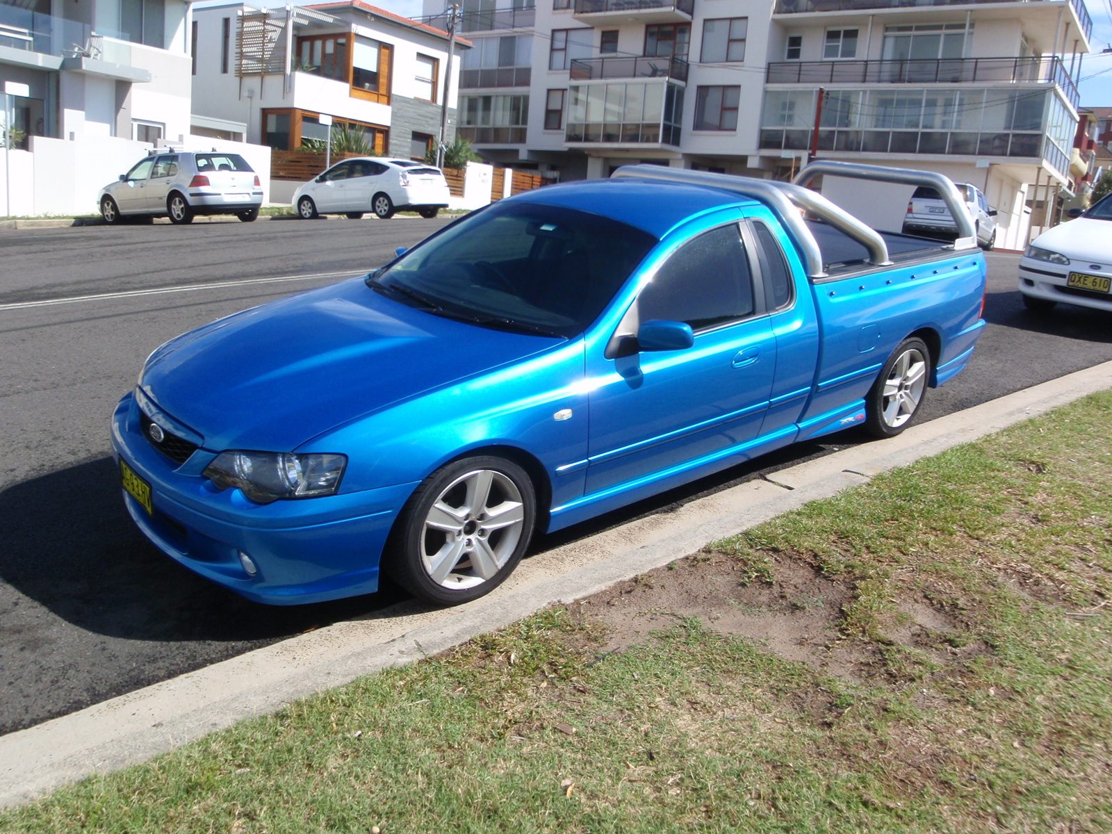 This is totally a made up car.  The blue oval suggests it is a Ford.  These were everywhere in Sydney. 