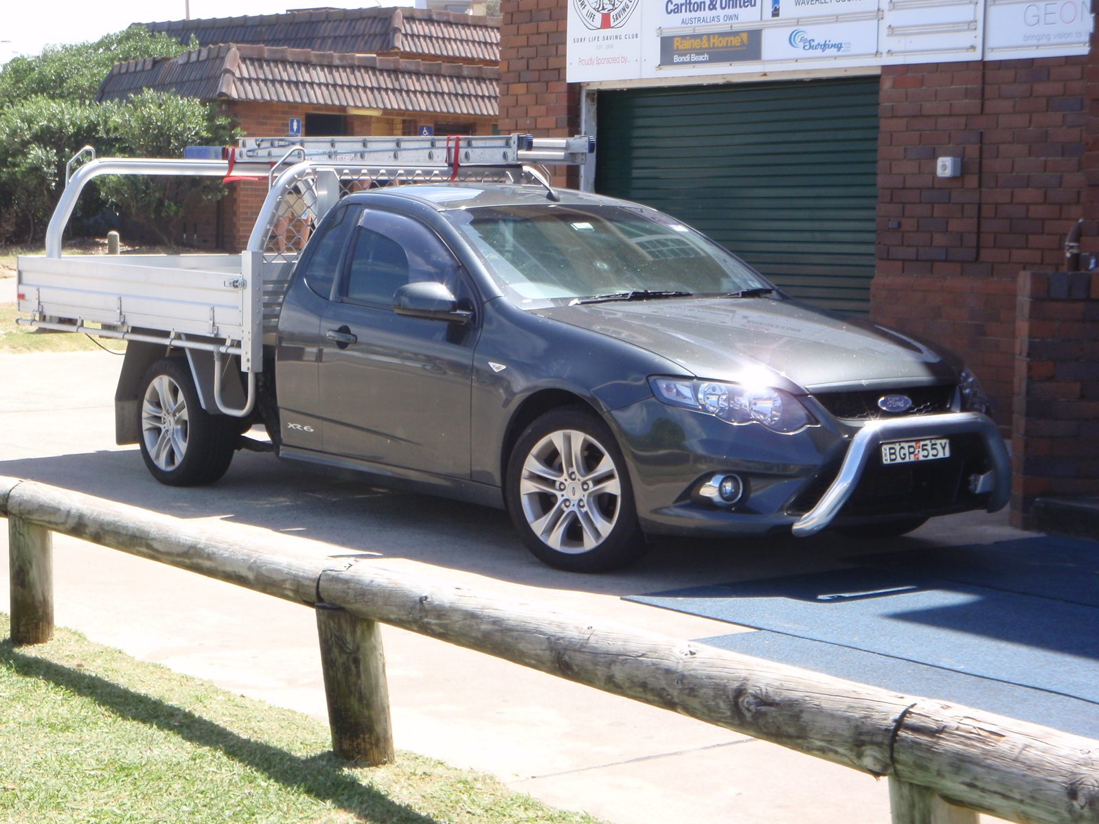 This totally looks photoshopped.  Really, all the pickup trucks (driven by tradies (Australian...